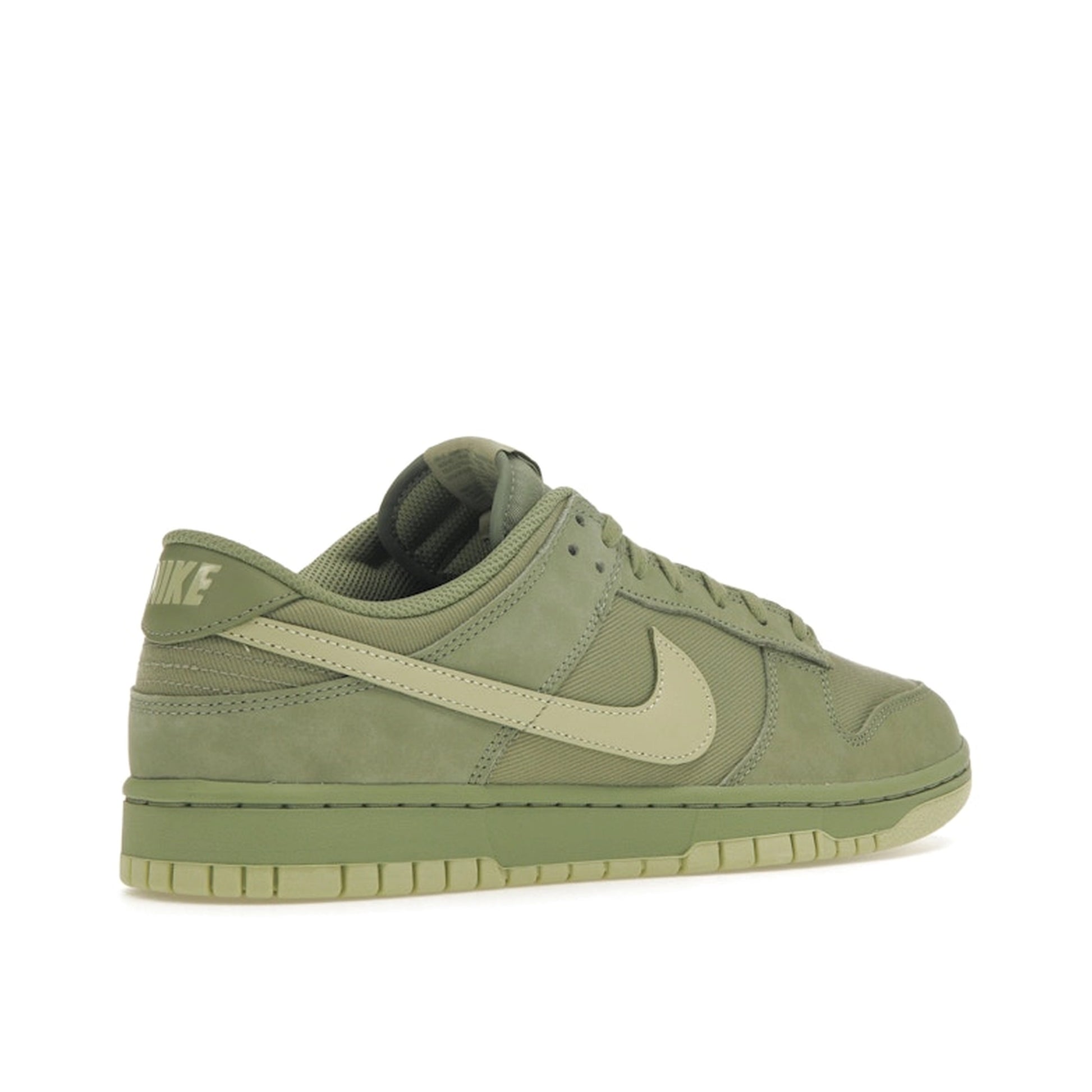 Nike Dunk Low Retro Premium sneakers, back view, model FB8895-300 in oil green color.