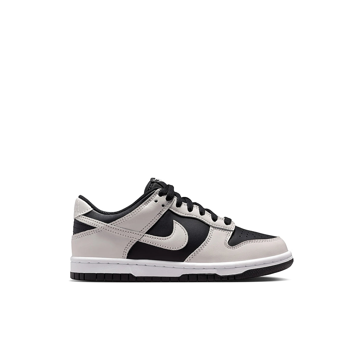 Nike Dunk Low kids in black leather with white and platinum tint accents