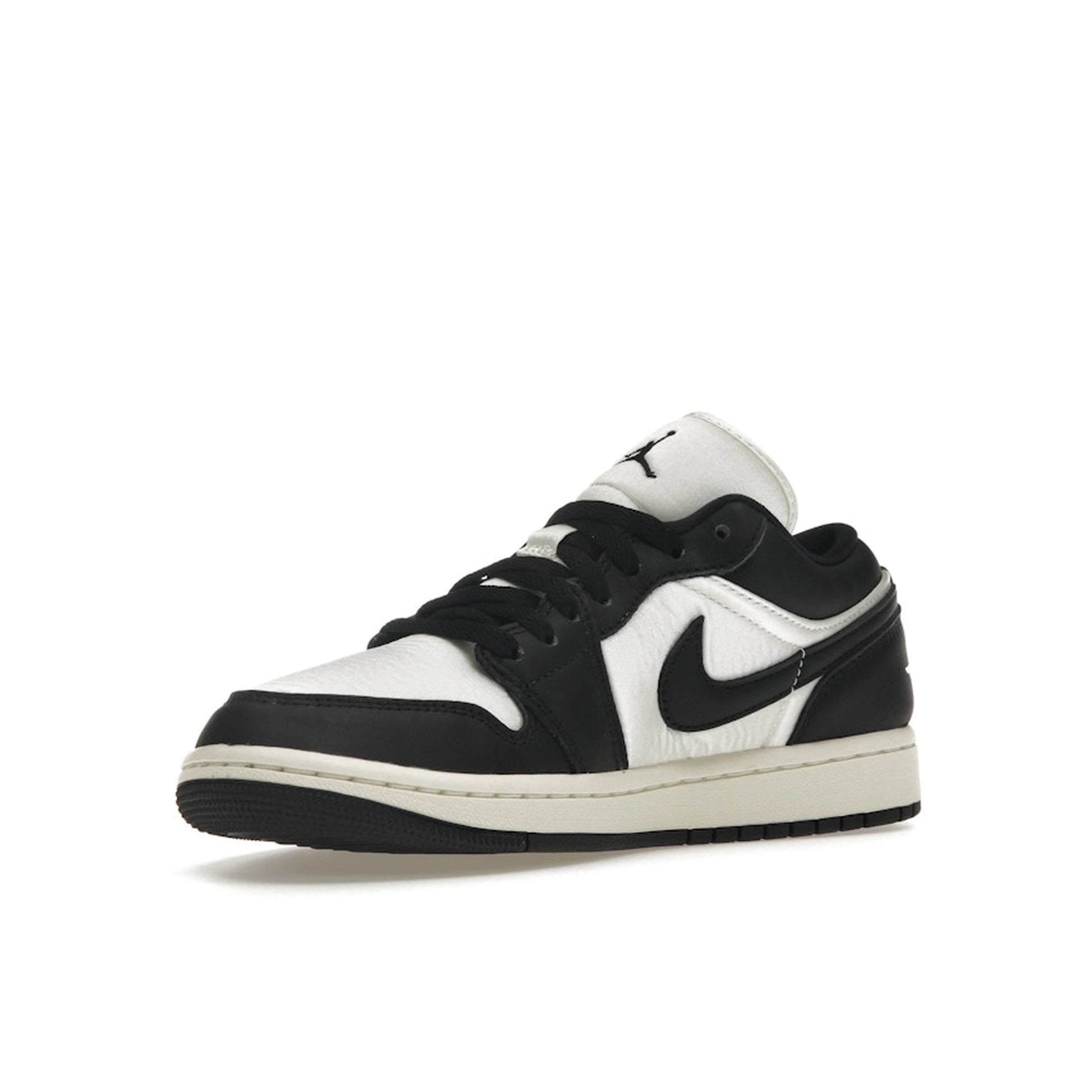 Air Jordan 1 Low SE Women’s sneakers, front view, in vintage black and white panda colorway.