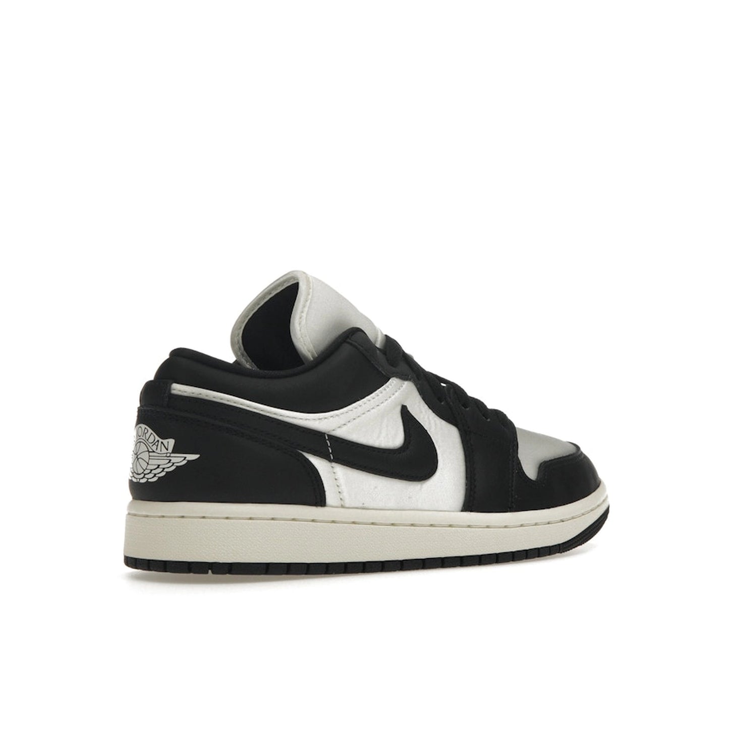 Air Jordan 1 Low SE Women’s sneakers, back view, in vintage black and white panda colorway.