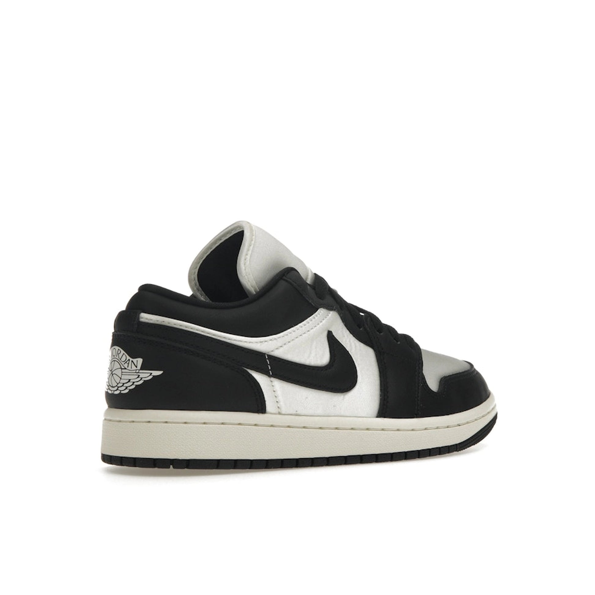 Air Jordan 1 Low SE Women’s sneakers, back view, in vintage black and white panda colorway.