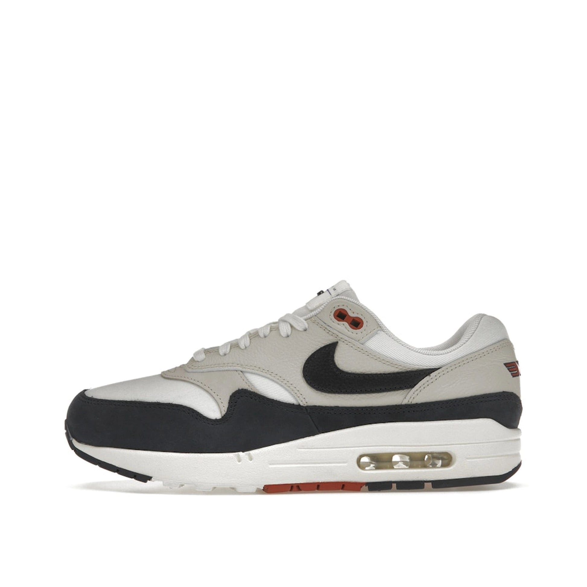 Nike Air Max 1 LX Obsidian Light Orewood Brown Women's sneakers, side view, model FD2370-110 in obsidian with light orewood brown accents.