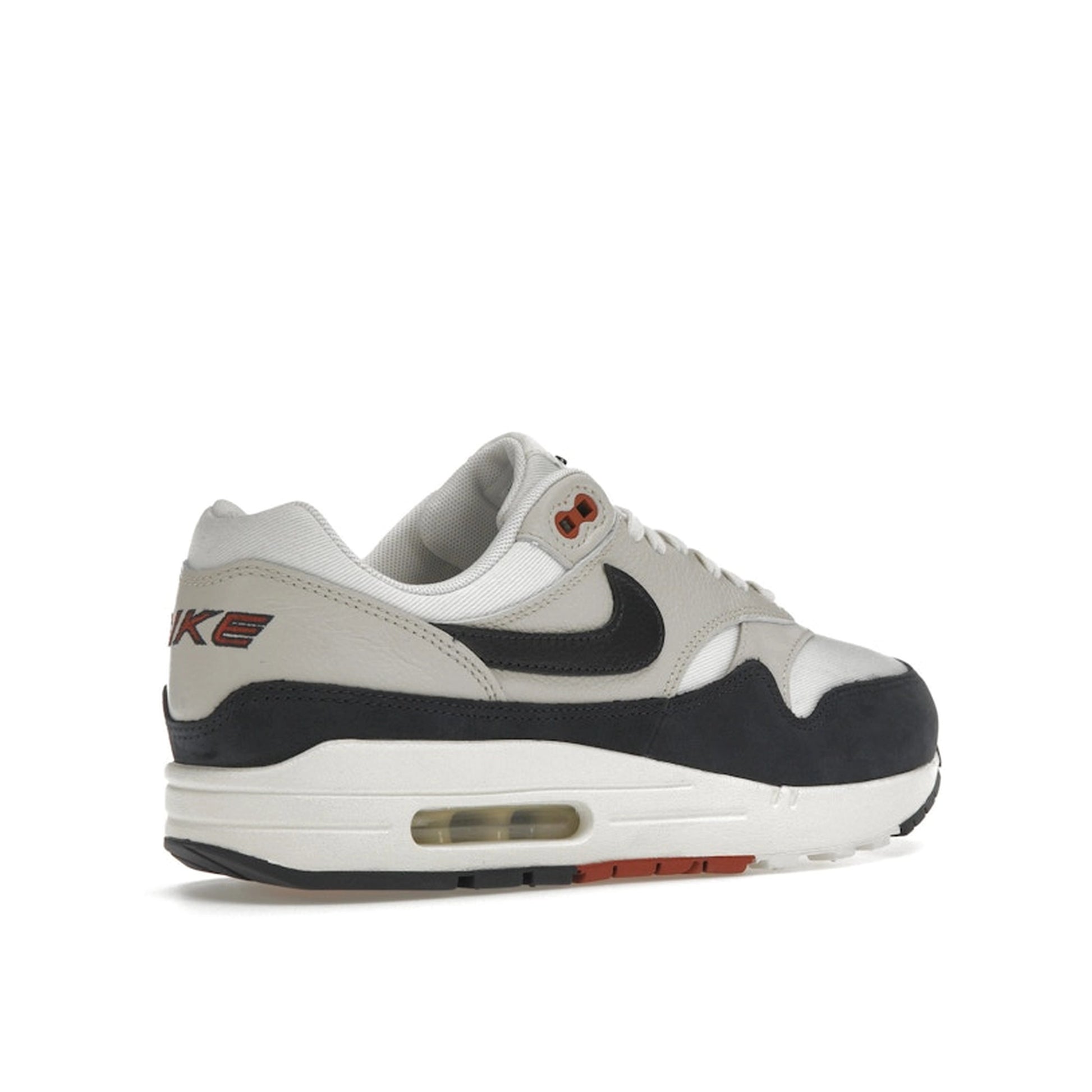 Nike Air Max 1 LX Obsidian Light Orewood Brown Women's sneakers, back view, model FD2370-110 in obsidian with light orewood brown accents.