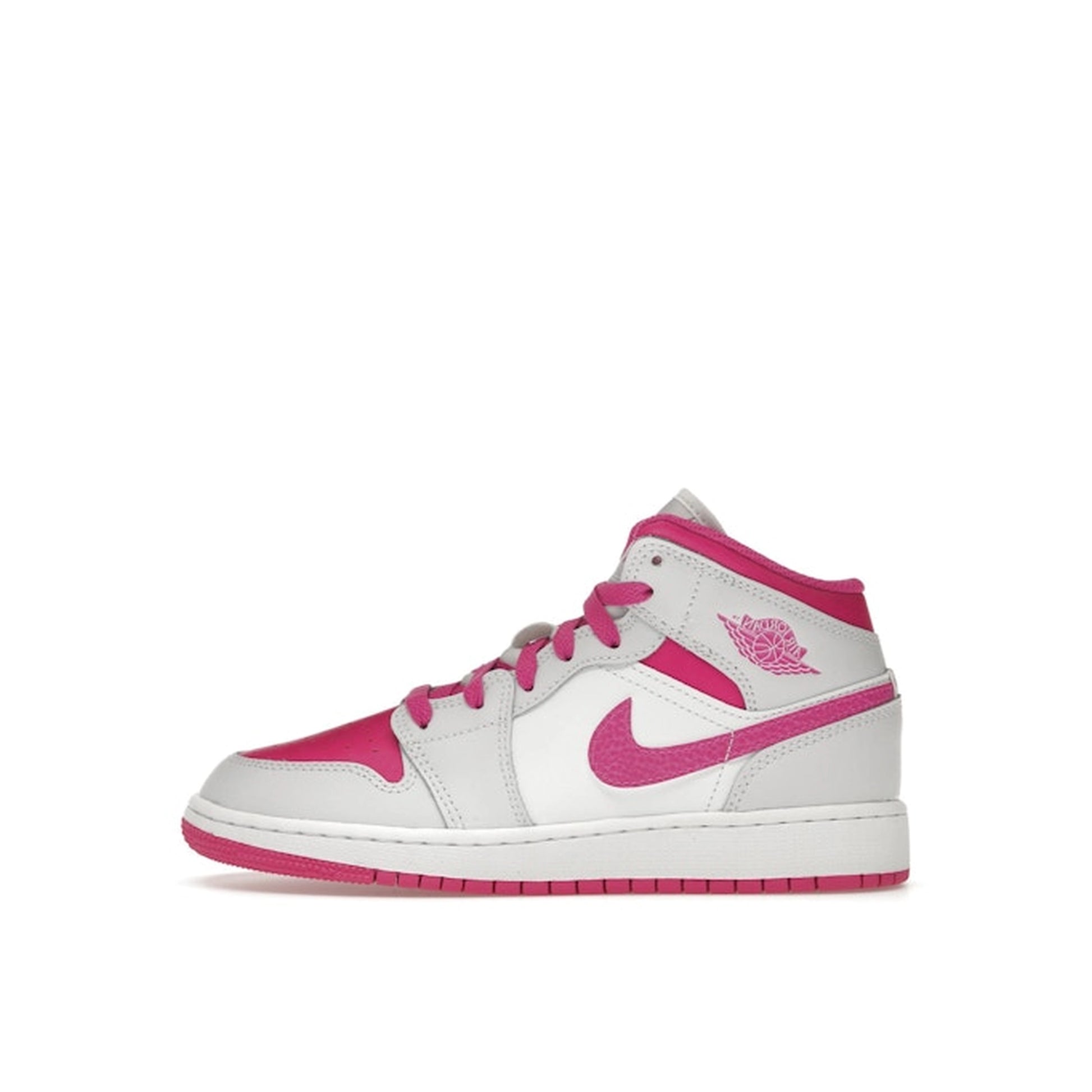 Jordan 1 Mid Fire Pink GS sneakers, side view, model FD8780-500, in vibrant fire pink with white accents.