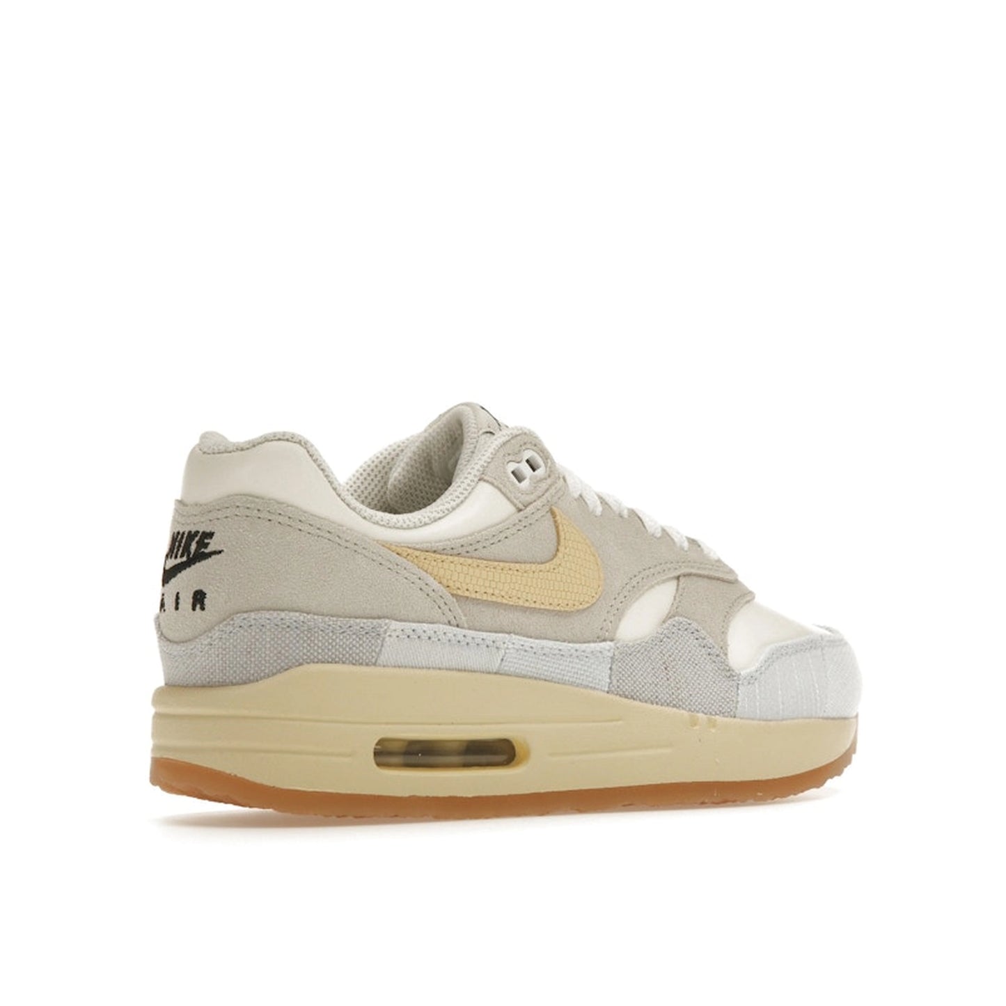 Nike Air Max 1 '87 Crepe sneakers, back view, model FJ4735-001, light bone with cream and beige accents.