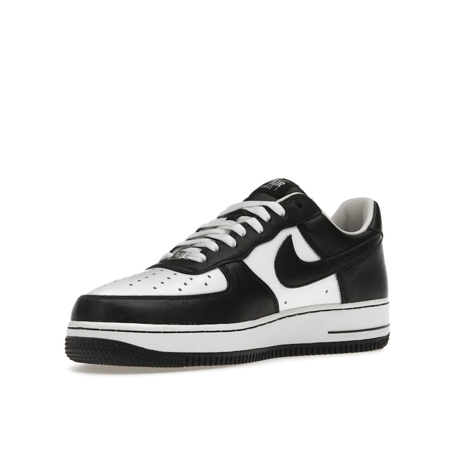 Nike Air Force 1 x Terror Squad sneakers, front view, model FJ5756-100 in black with white details.