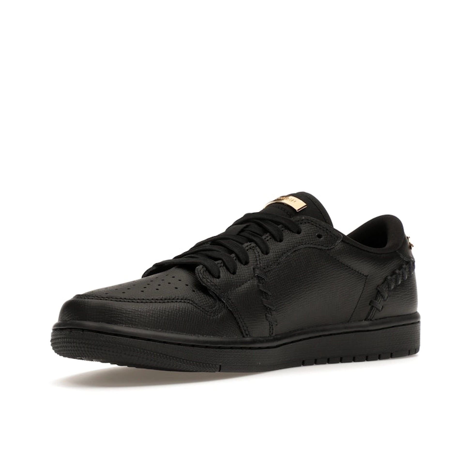 Jordan 1 Low Method of Make sneakers, front view, model FN5032-007, women's, black with metallic gold accents.