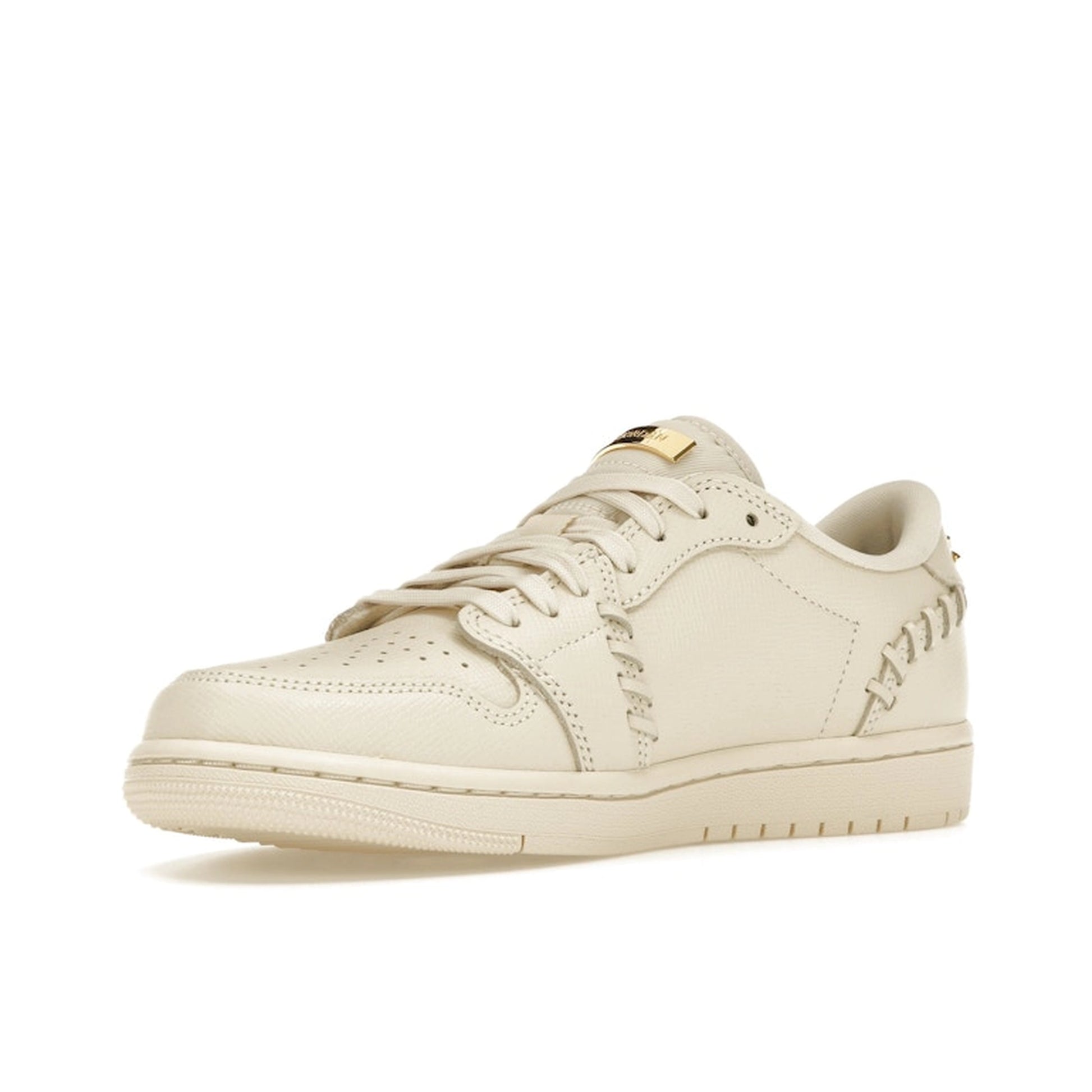 Jordan 1 Low Method of Make Women’s, front view, in light tan leather with monochrome finish.