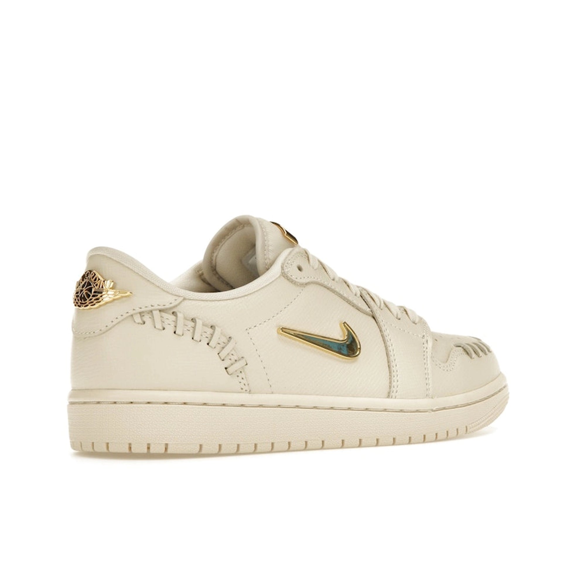 Jordan 1 Low Method of Make Women’s, back view, in light tan leather with monochrome finish.
