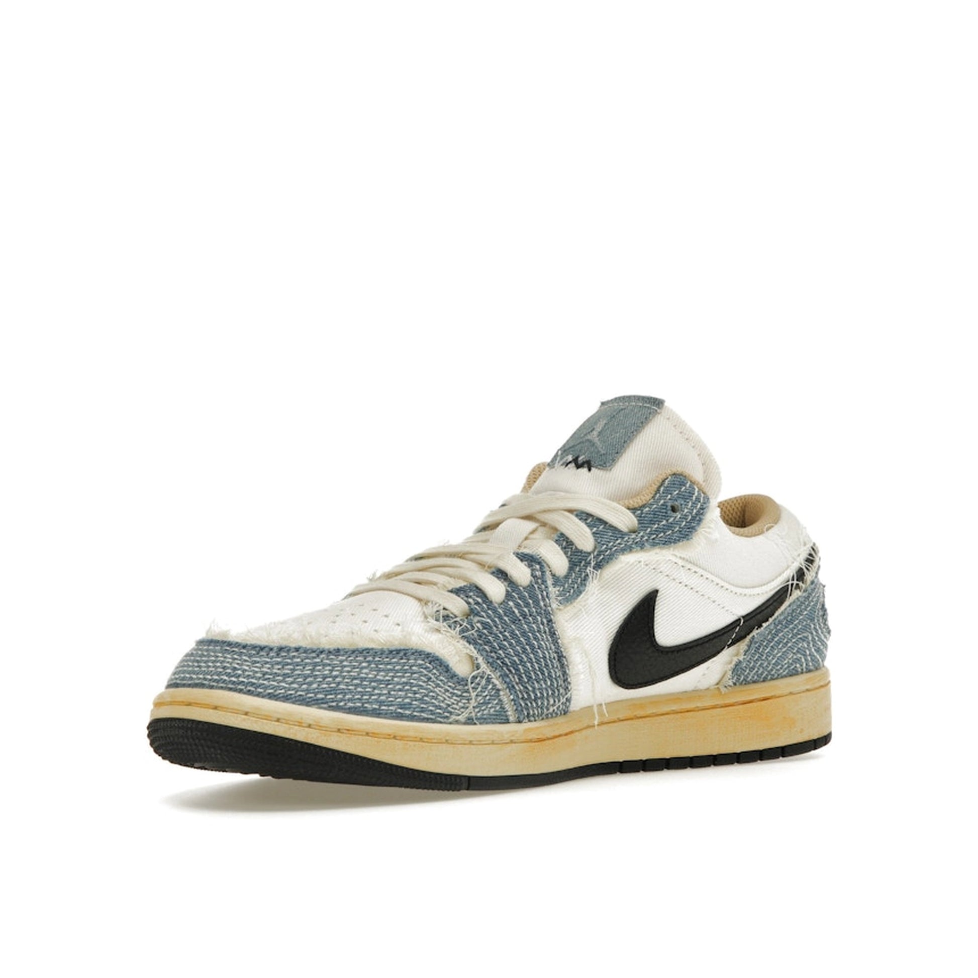 Air Jordan 1 Low SE WRMK Sashiko sneakers, front view, model FN7670-493, blue with sashiko stitching.