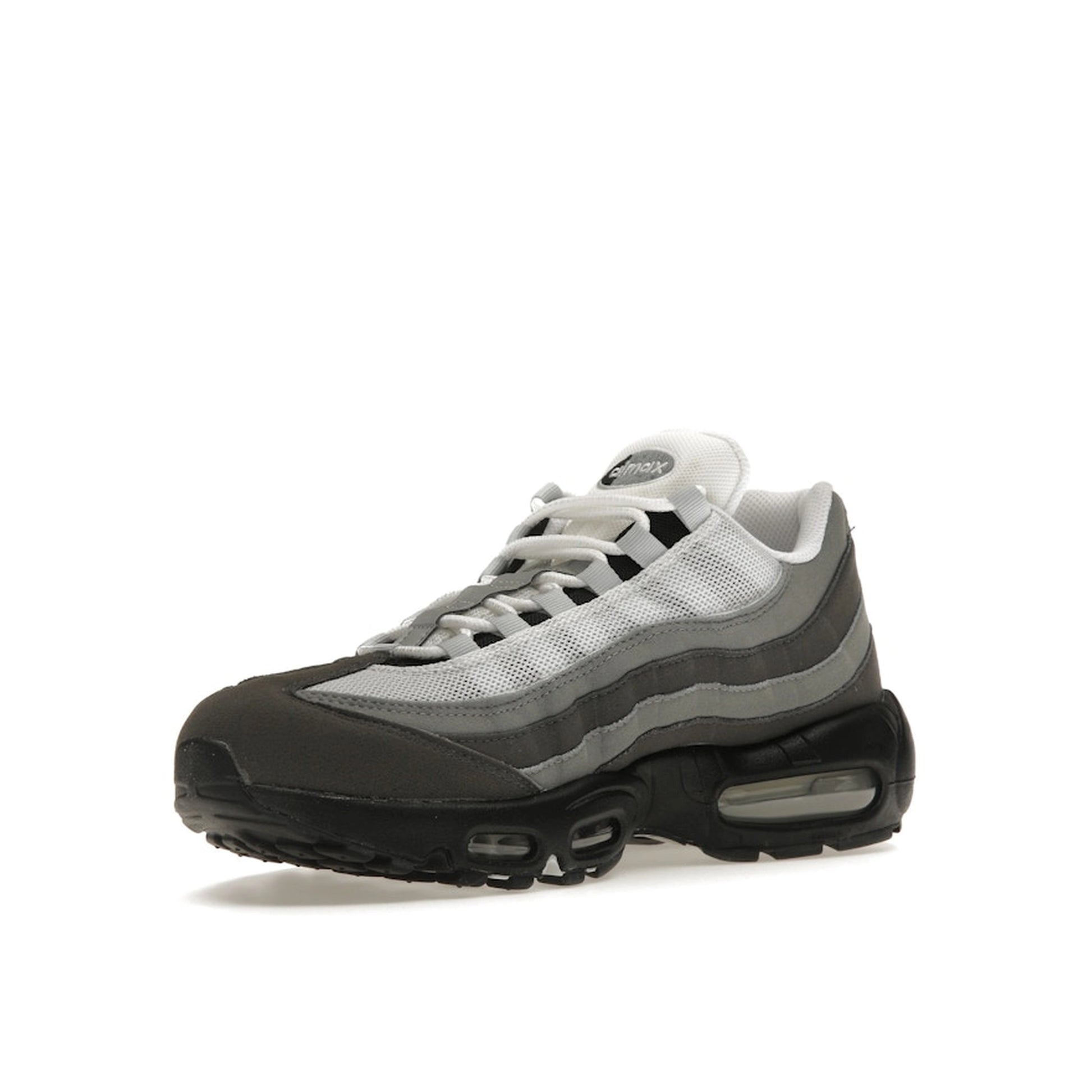 Nike Air Max 95 Jewel Swoosh sneakers, front view, model FQ1235-002, in grey with jewel swoosh detailing.