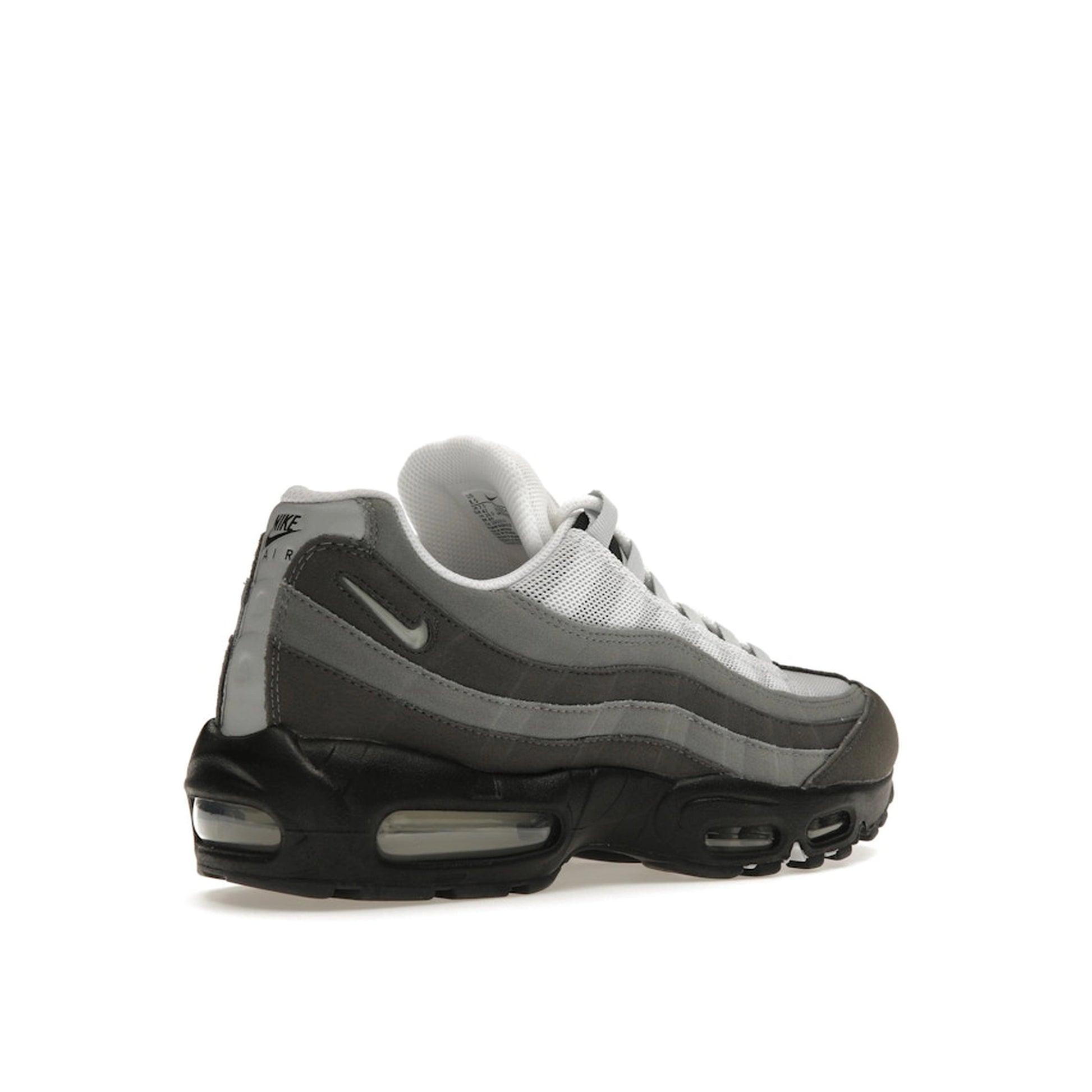 Nike Air Max 95 Jewel Swoosh sneakers, back view, model FQ1235-002, in grey with jewel swoosh detailing.