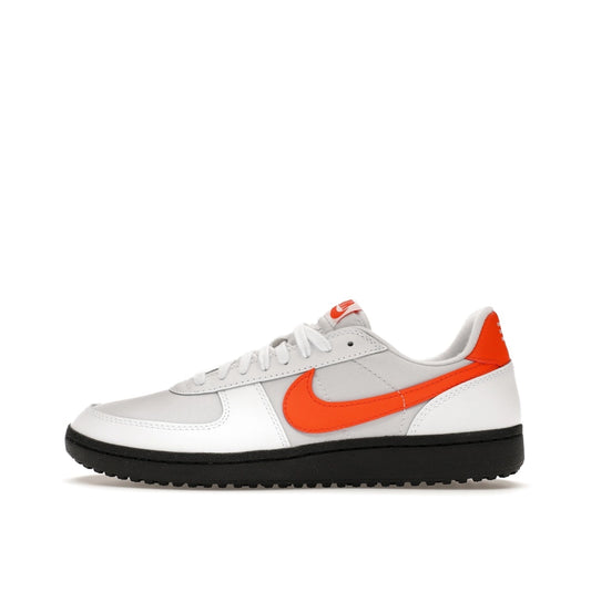 Nike Field General ’82, side view, in white leather with orange blaze swoosh and details.