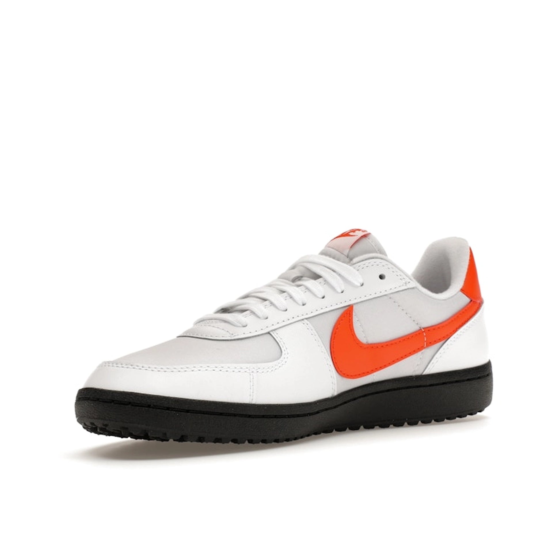 Nike Field General ’82, front view, in white leather with orange blaze swoosh and details.