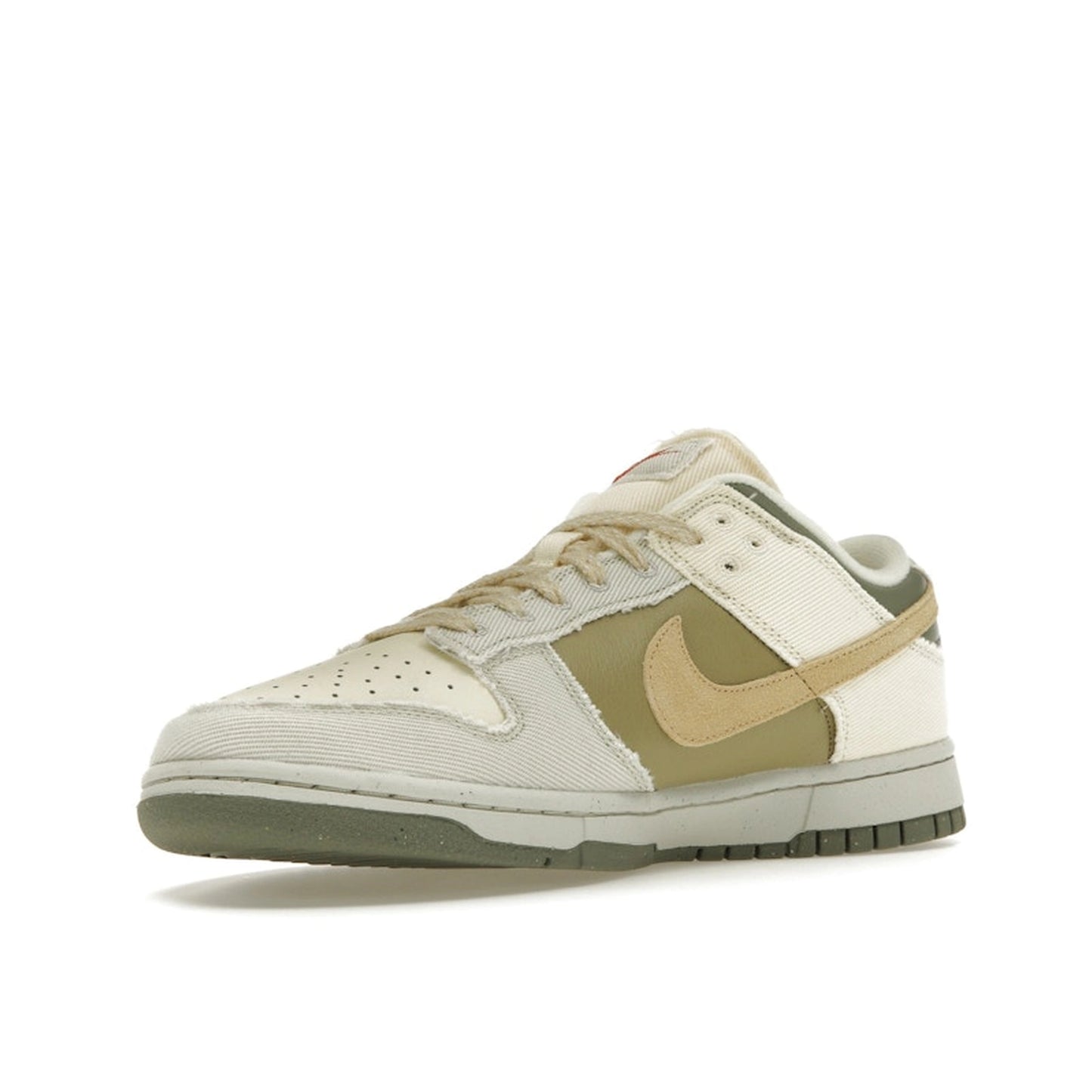 Nike Dunk Low Women's sneakers, front view, model FZ4341-100, in light bone with dark stucco and white accents.