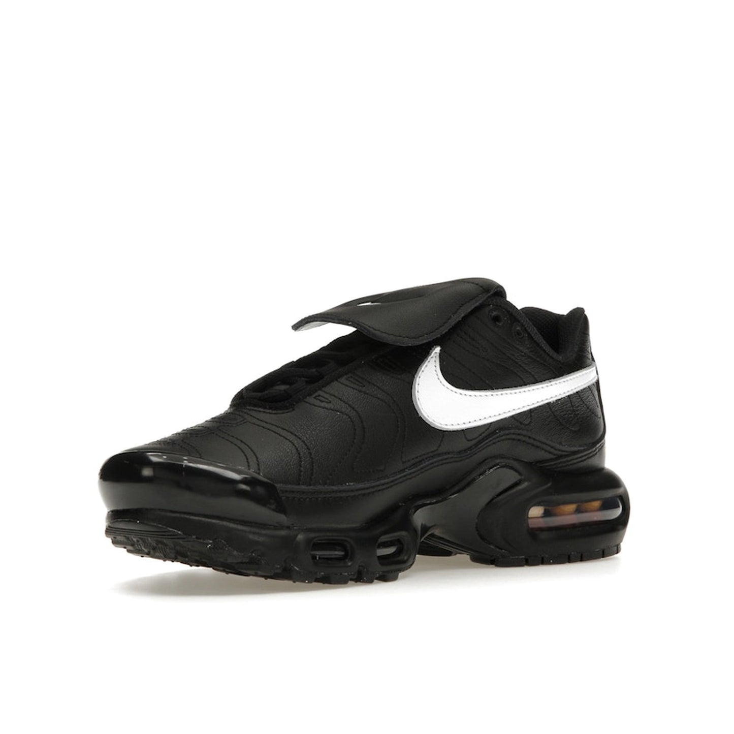 Nike Air Max Plus Tiempo, front view, in black leather with white swoosh and sole.