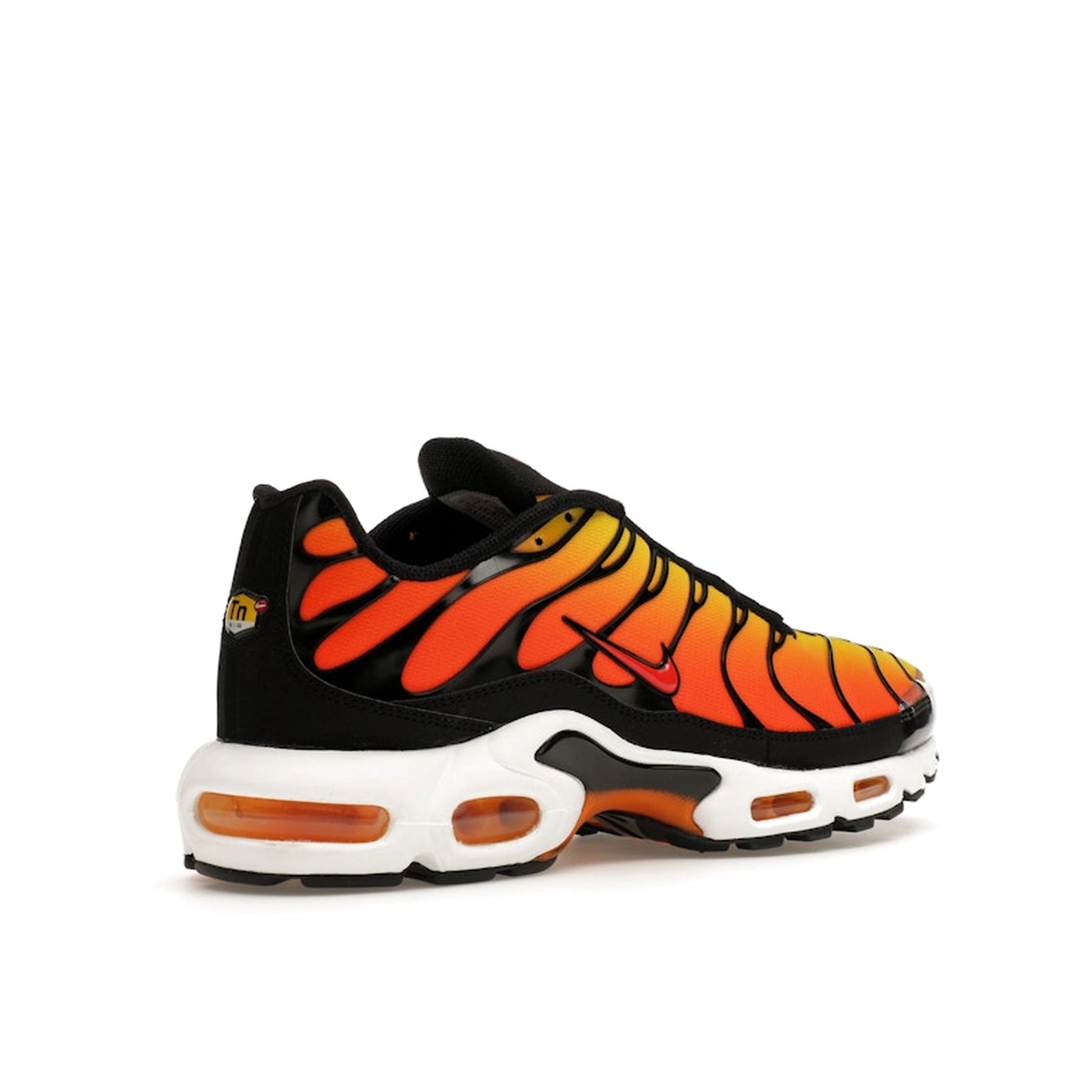 Nike Air Max Plus Sunset (2024) sneakers, back view, model HF0552-001, with an orange-to-yellow gradient.