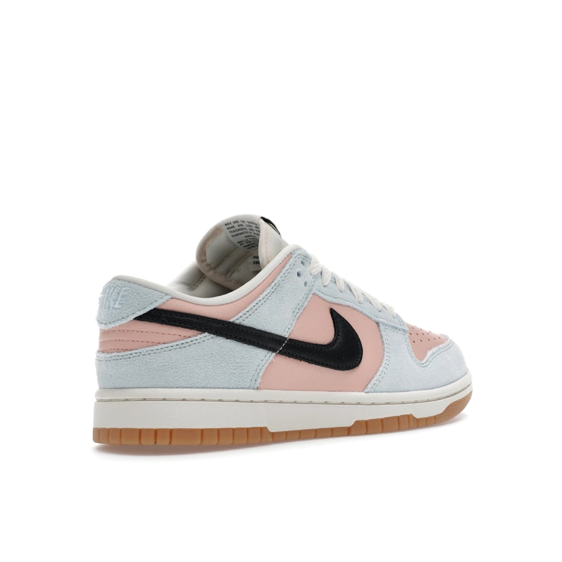 Nike Dunk Low Women’s sneakers, back view, in glacier blue with arctic orange accents.