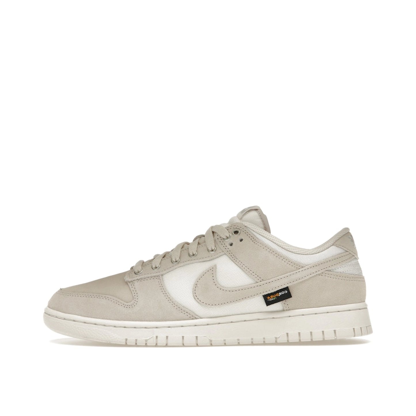 Nike Dunk Low sneakers, side view, in light orewood brown with Cordura fabric construction.