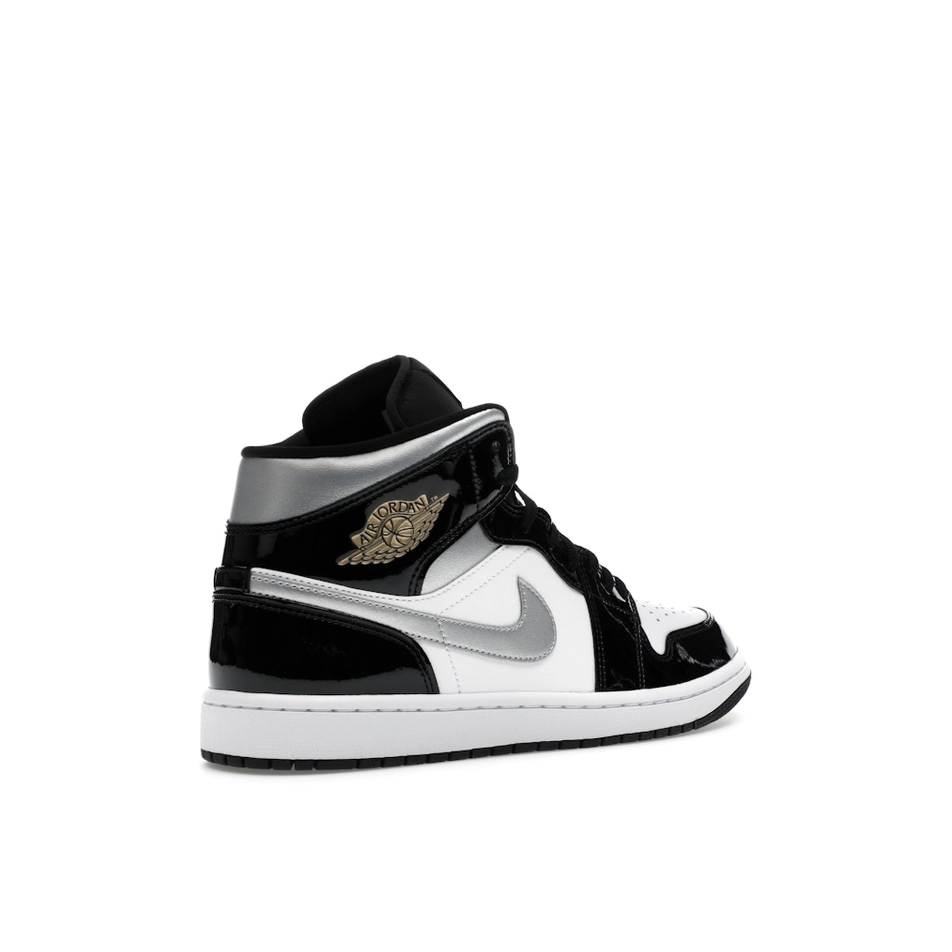 Jordan 1 Mid SE Patent sneakers, back view, in black, white, silver, and gold patent leather.