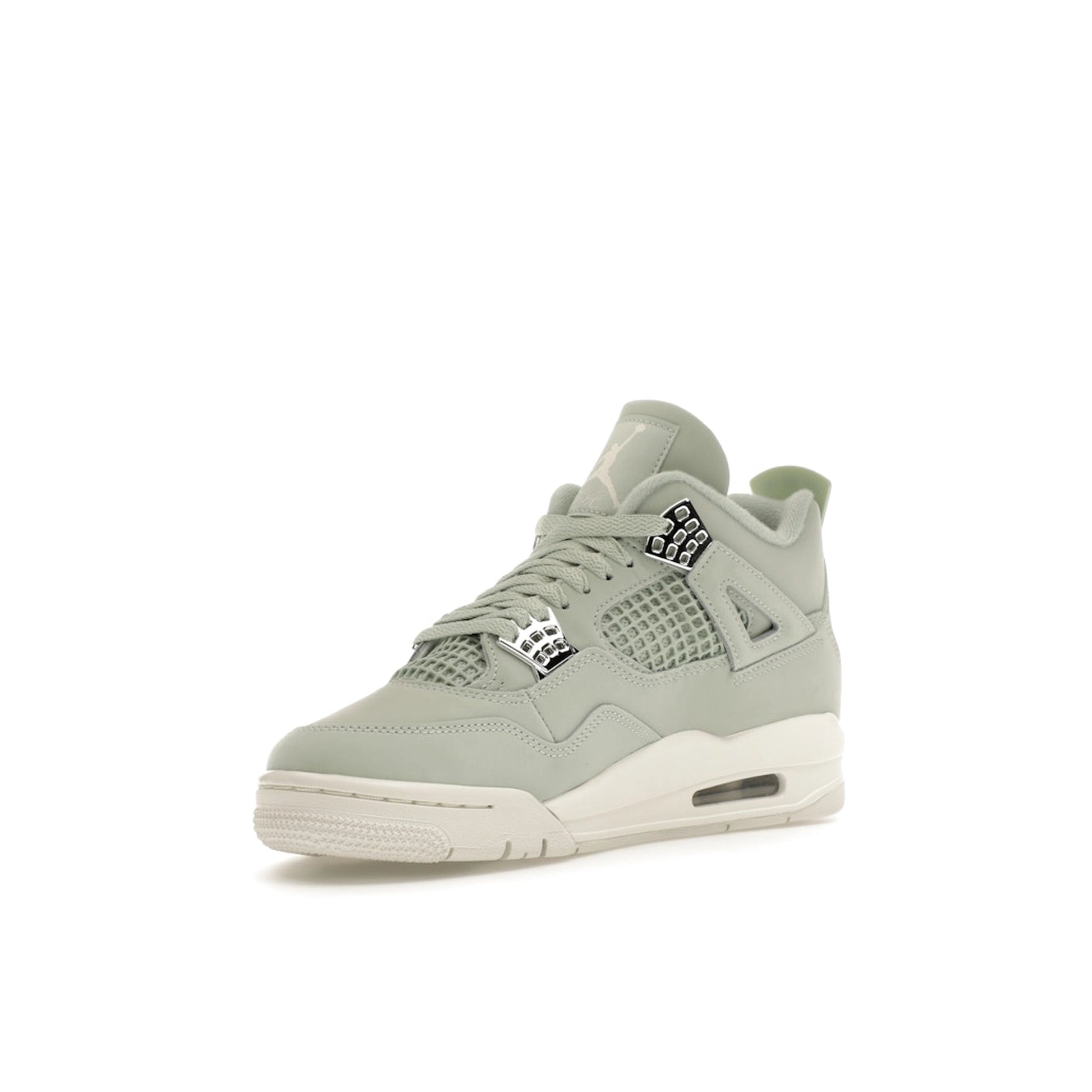 Air Jordan 4 Retro Women’s sneakers, front view, in seafoam green with metallic details.