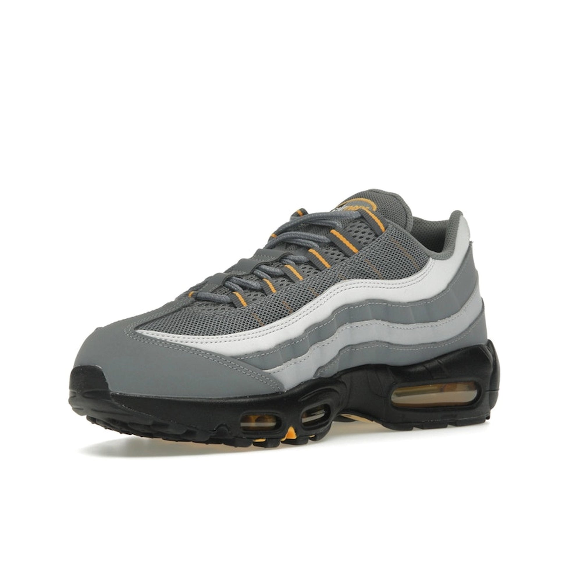 Nike Air Max 95 Cool Grey Sundial, front view, in layered grey tones with vibrant yellow accents.