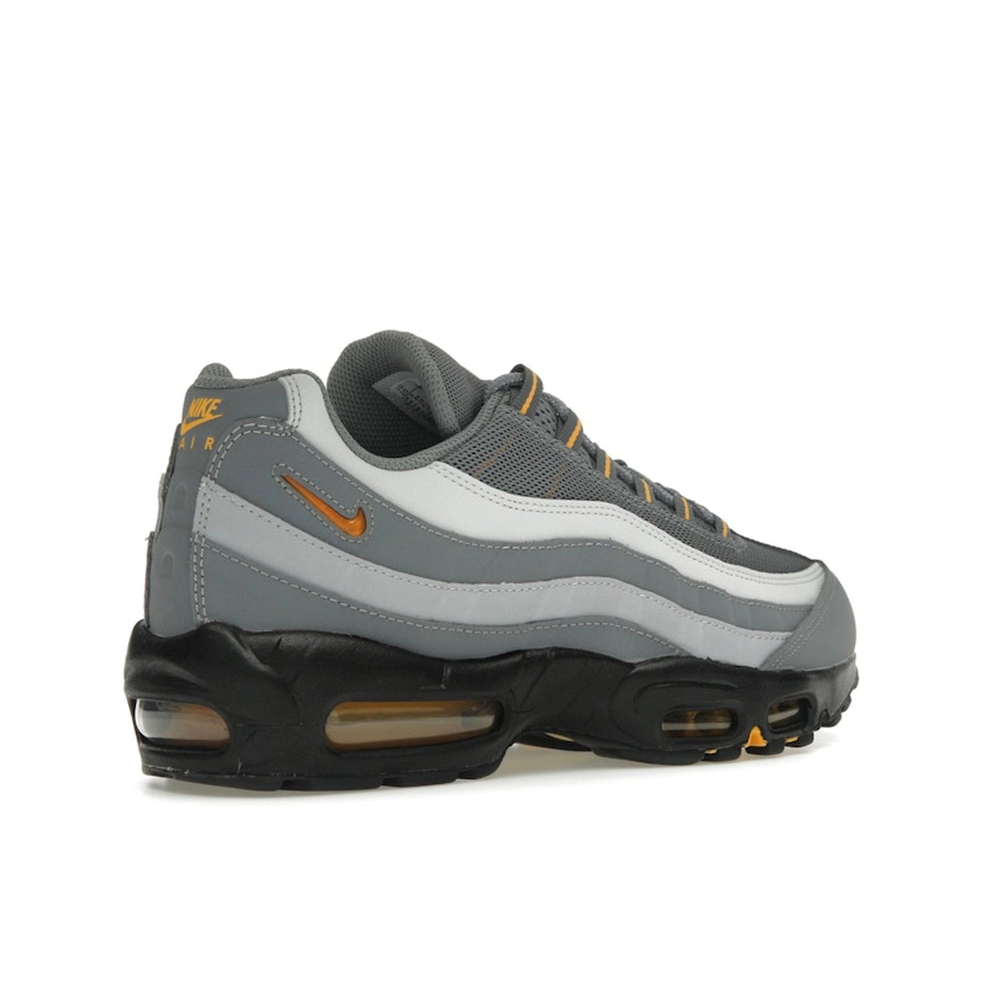 Nike Air Max 95 Cool Grey Sundial, back view, in layered grey tones with vibrant yellow accents.