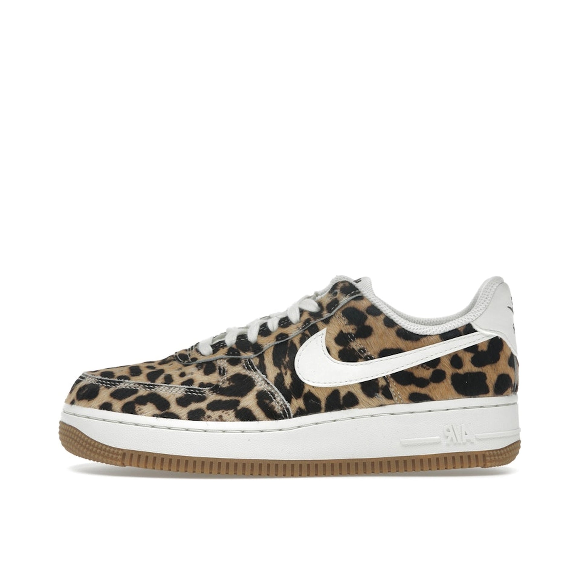Nike Air Force 1 Low Cheetah, side view, textured suede with safari-inspired pattern.