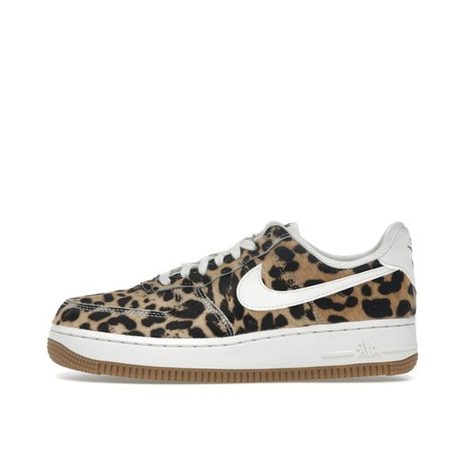 Nike Air Force 1 Low Cheetah, side view, textured suede with safari-inspired pattern.