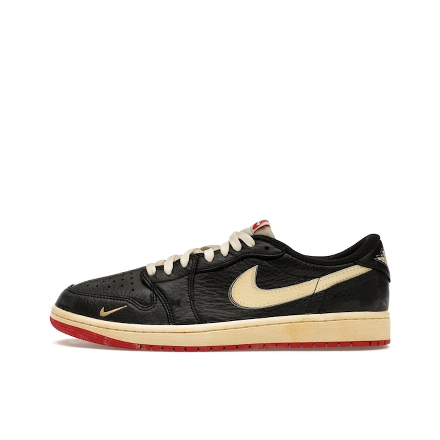 Jordan 1 Retro Low OG Nigel Sylvester, side view, distressed black upper with aged details.