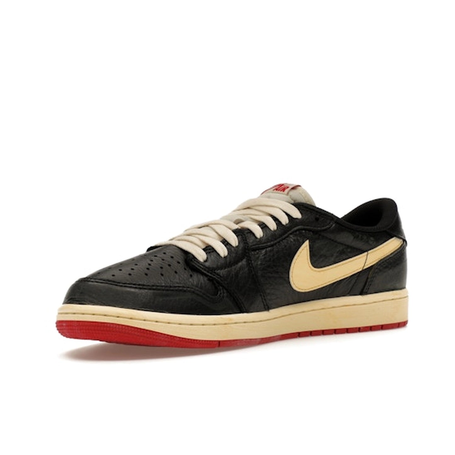 Jordan 1 Retro Low OG Nigel Sylvester, front view, distressed black upper with aged details.