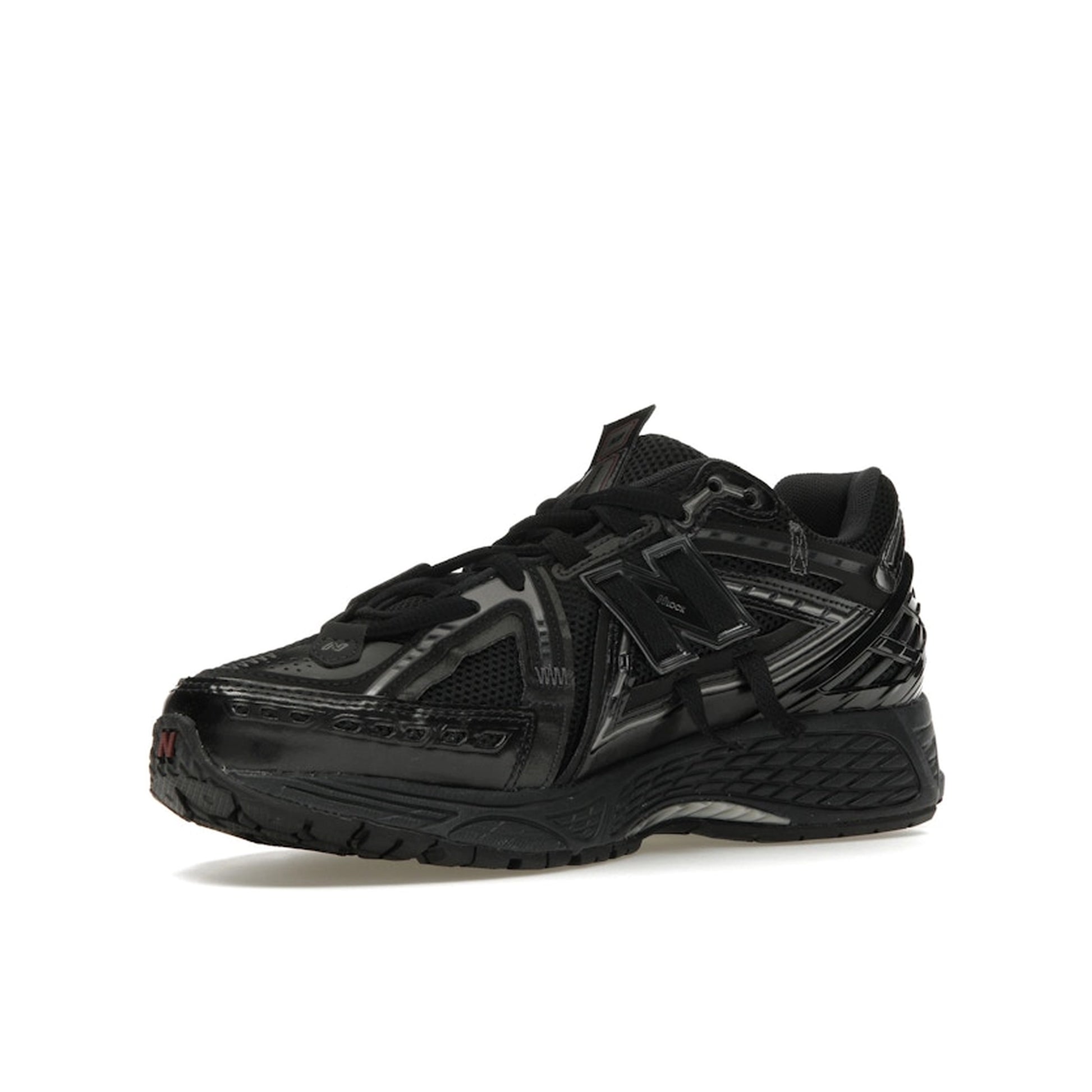 New Balance 1906A Black, front view, in technical mesh with modern runner design.