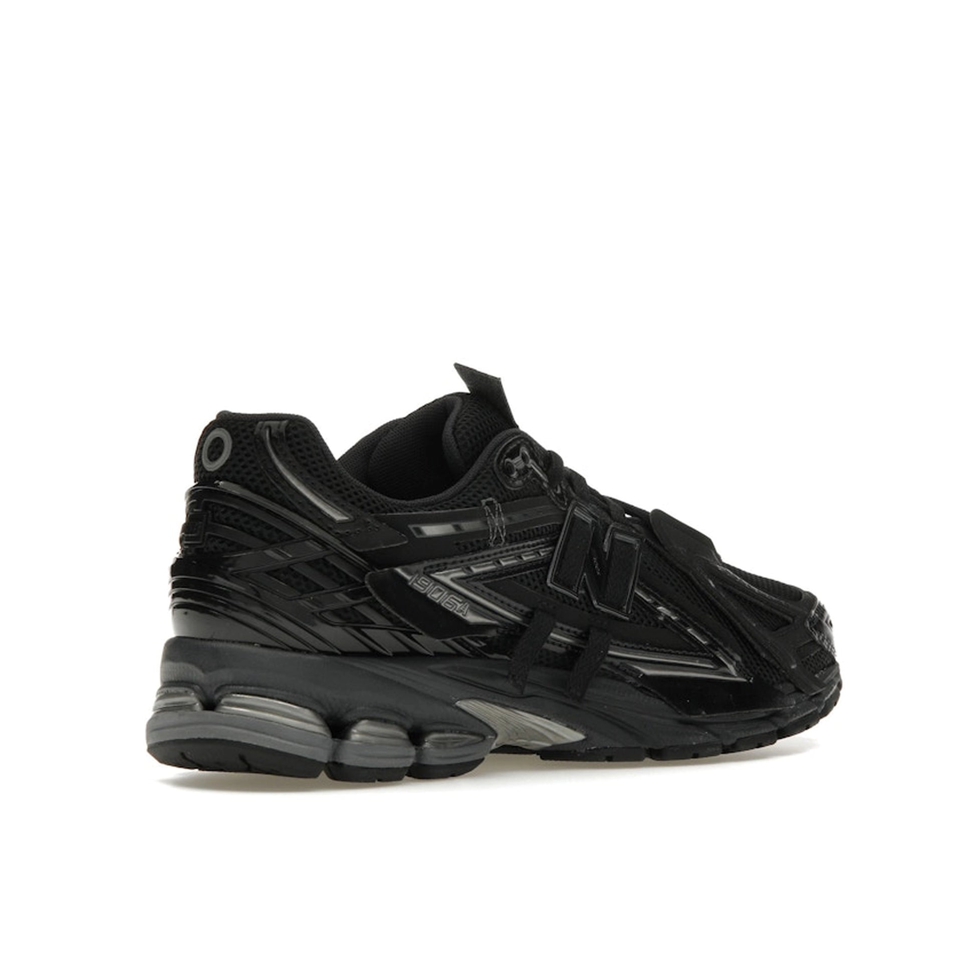New Balance 1906A Black, back view, in technical mesh with modern runner design.