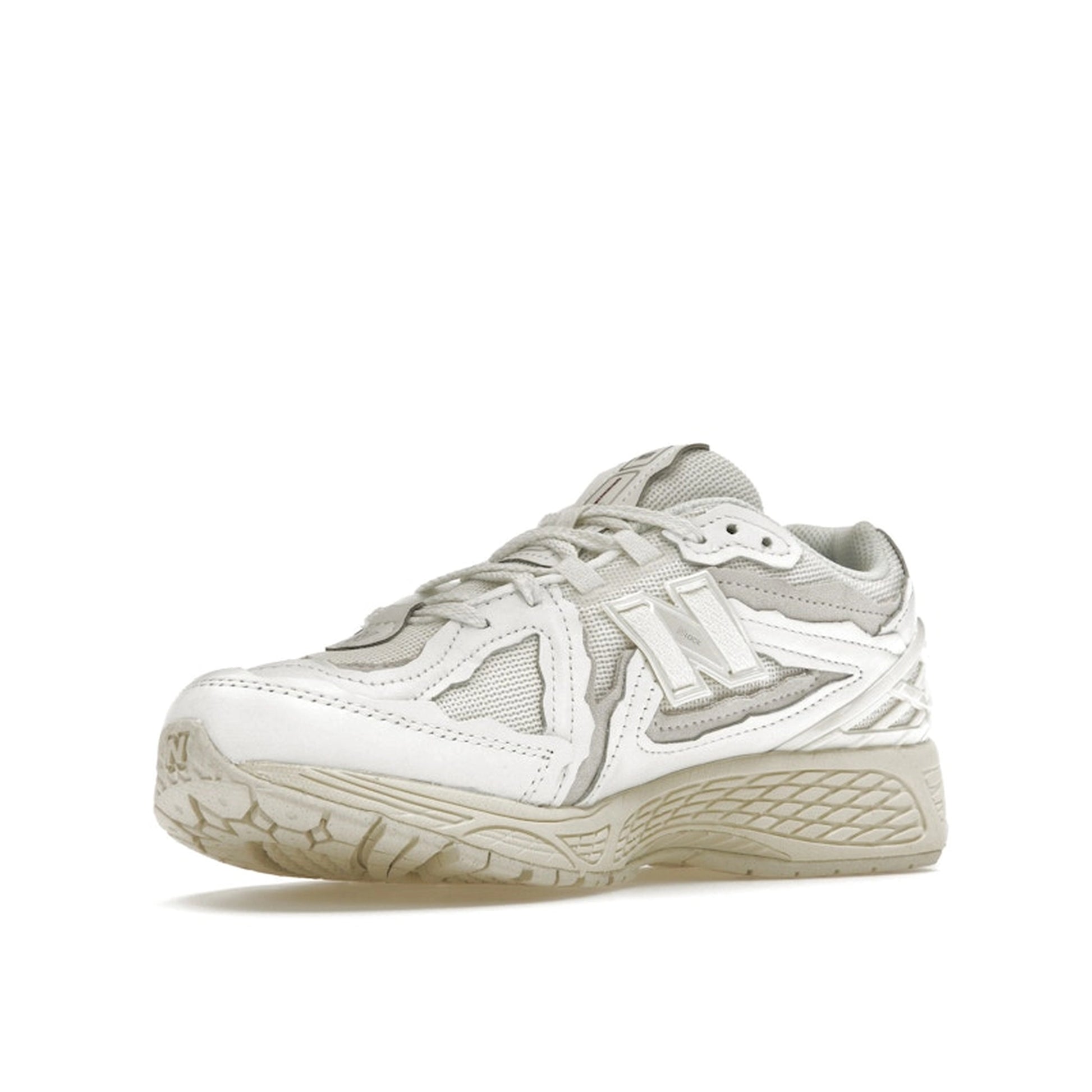 New Balance 1906D Protection Pack sneakers, front view, model M1906DE in total white.