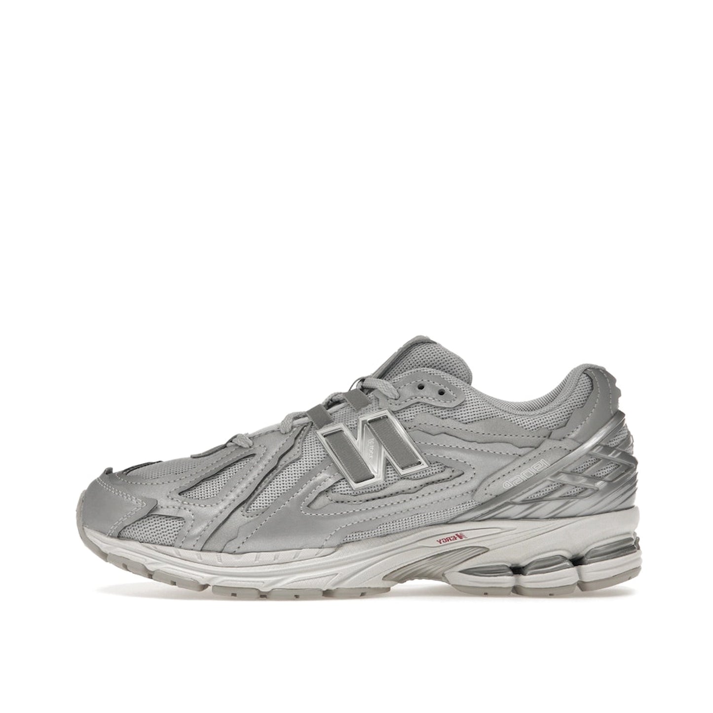 New Balance 1906D Protection Pack sneakers, side view, model M1906DH-1 in silver metallic with grey and white accents.