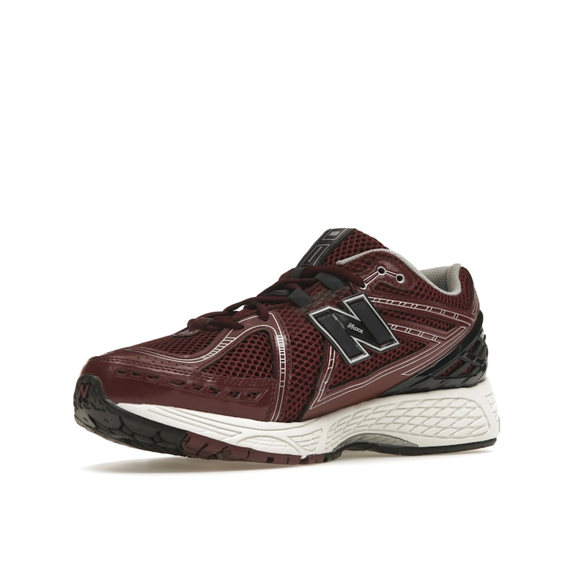 New Balance 1906R Burgundy Black sneakers, sole view, model M1906RCC in burgundy with black highlights.