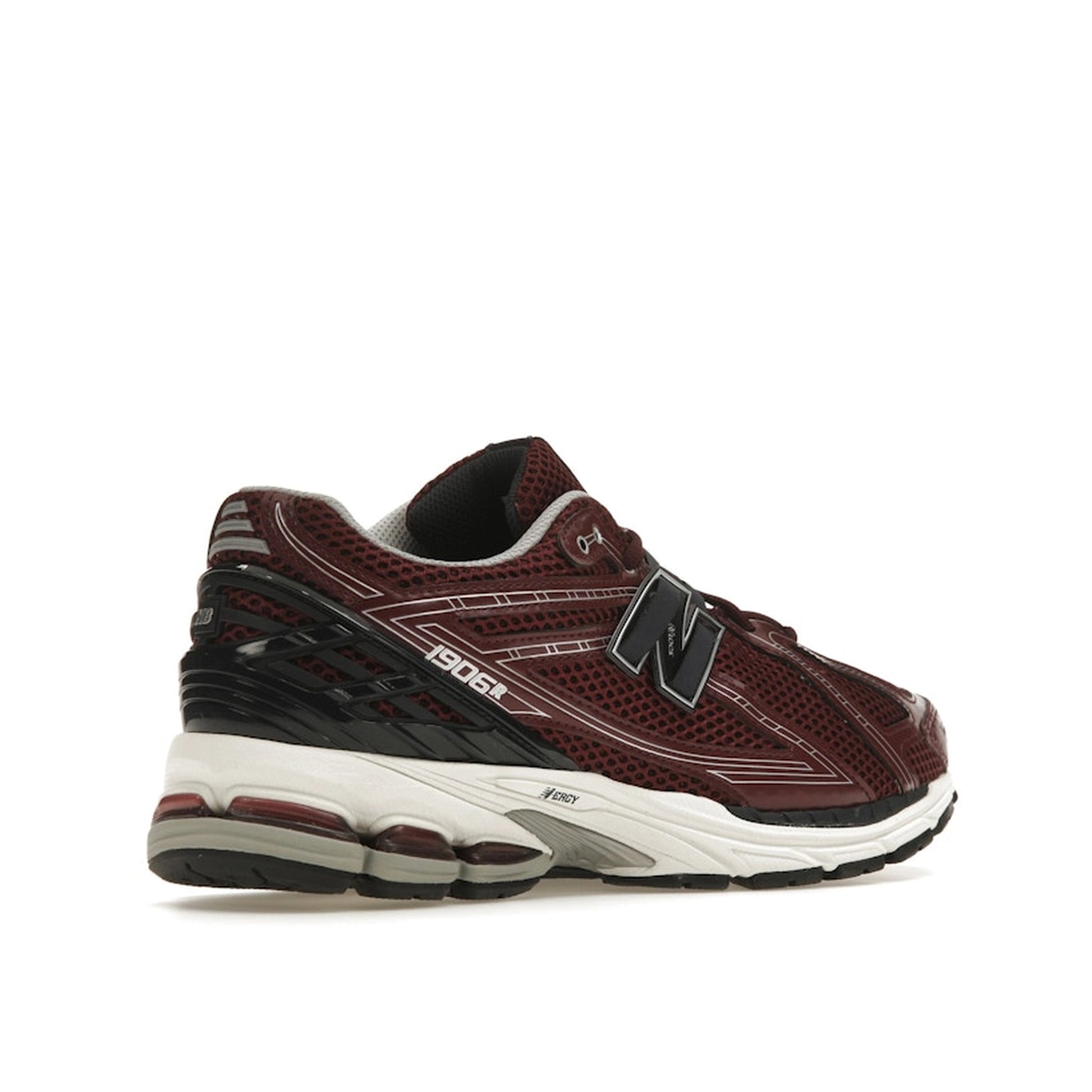 New Balance 1906R Burgundy Black sneakers, sole view, model M1906RCC in burgundy with black highlights.