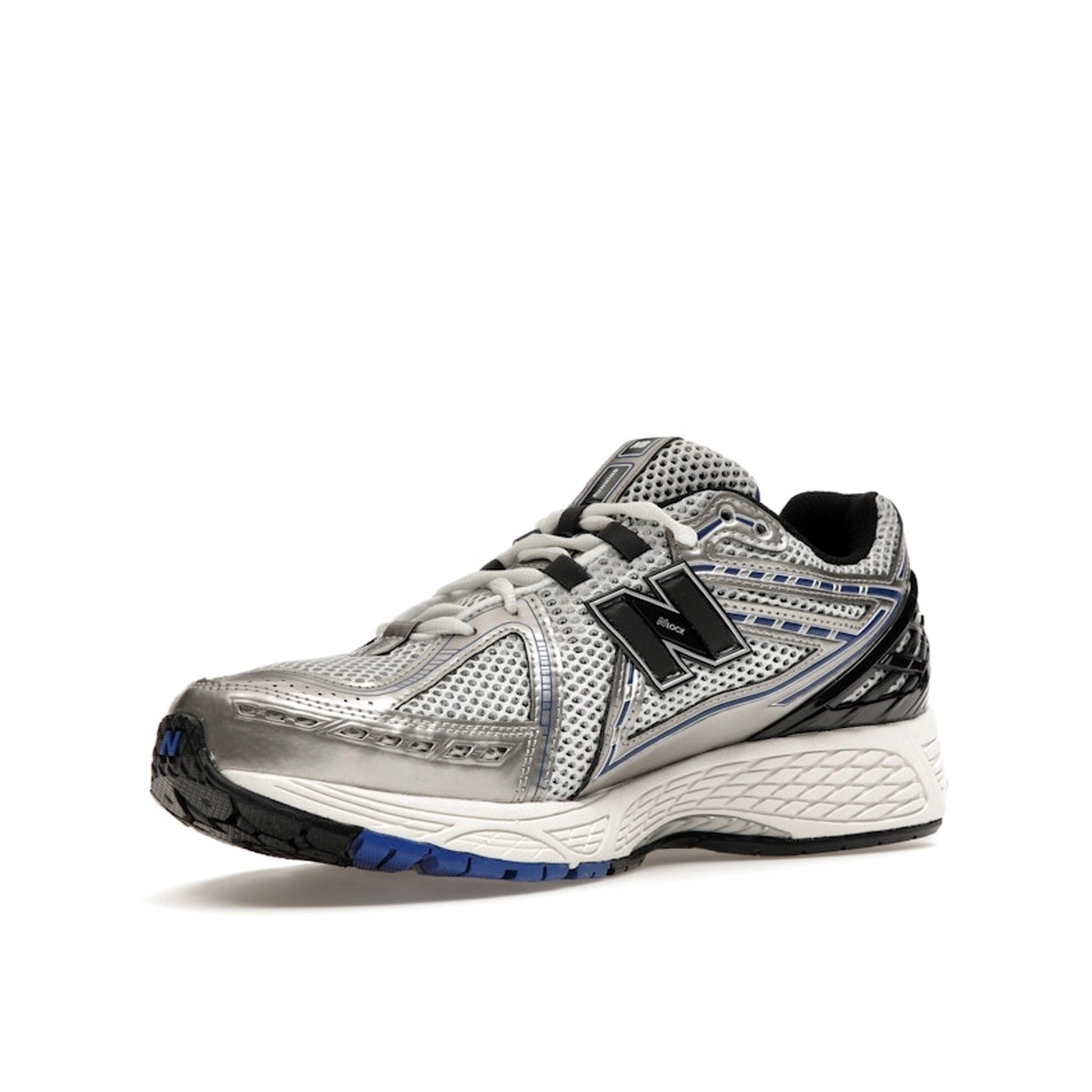 New Balance 1906R Metallic Silver Blue sneakers, sole view, model M1906RCD in metallic silver with blue accents.