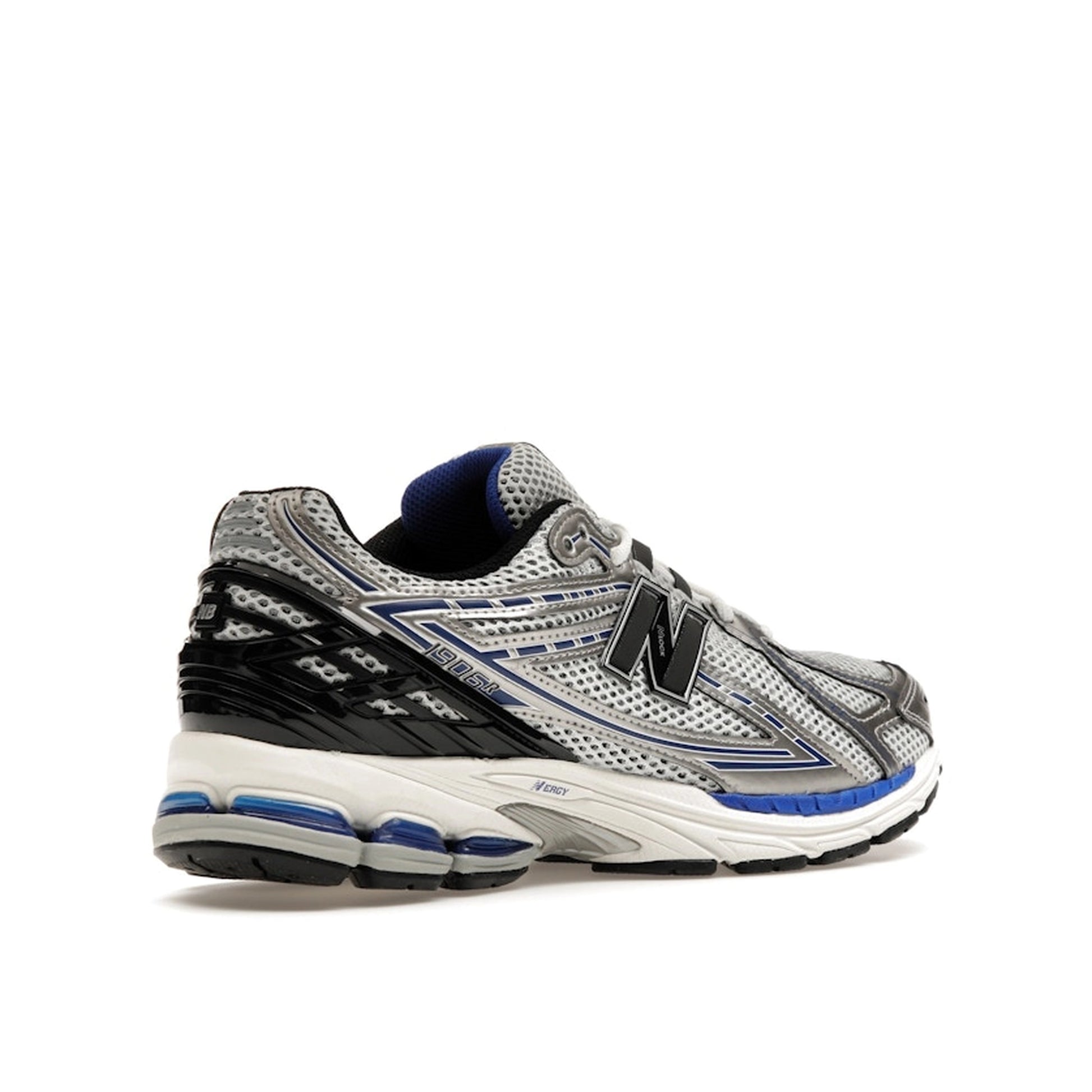 New Balance 1906R Metallic Silver Blue sneakers, sole view, model M1906RCD in metallic silver with blue accents.