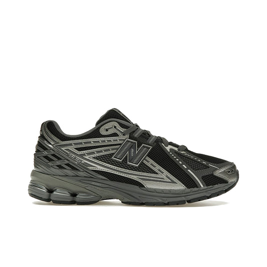 New Balance 1906R Phantom in black, dark grey, metallic silver leather