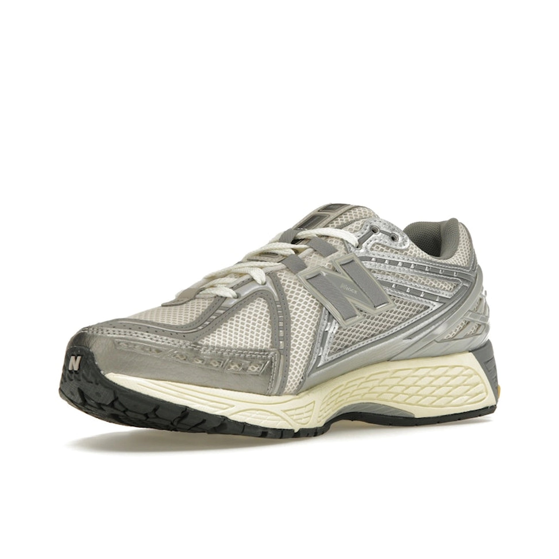 New Balance 1906 sneakers, front view, in breathable mesh upper with moonbeam and raincloud colorway.
