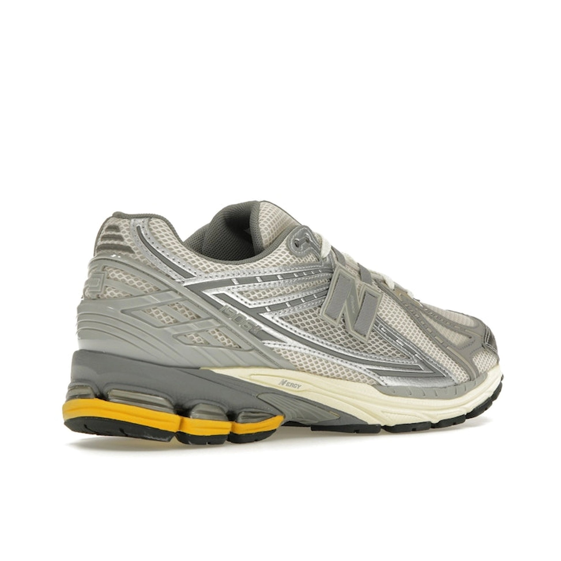 New Balance 1906 sneakers, back view, in breathable mesh upper with moonbeam and raincloud colorway.