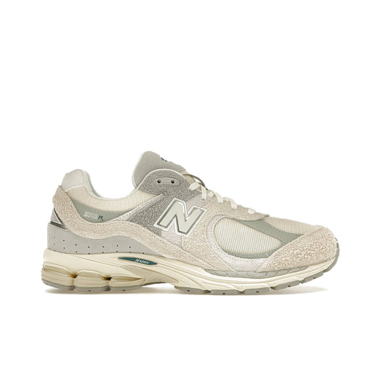 New Balance 2002R sneakers in linen and concrete with leather and denim accents