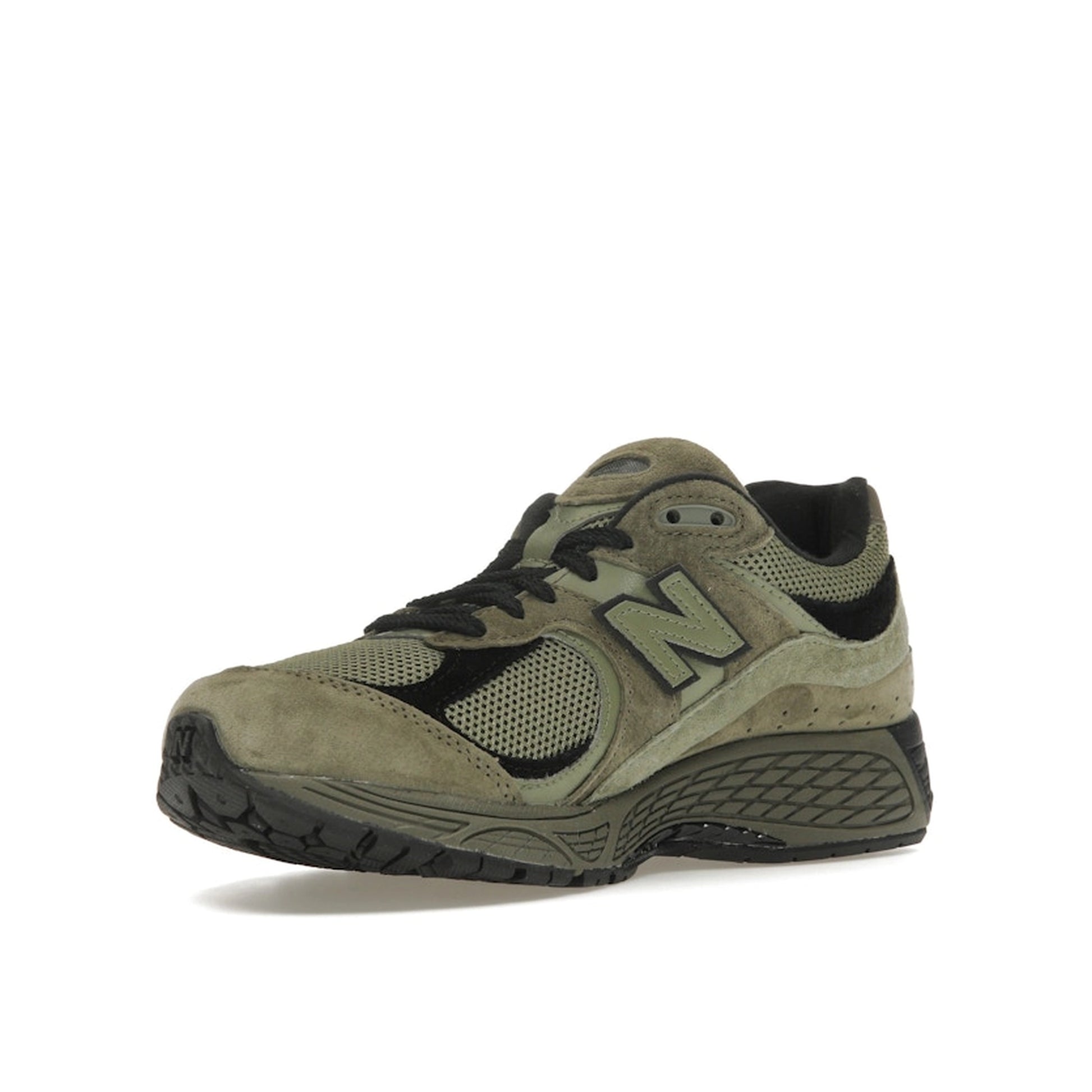 New Balance 2002R sneakers, front view, in dark camo with tonal olive suede and mesh.