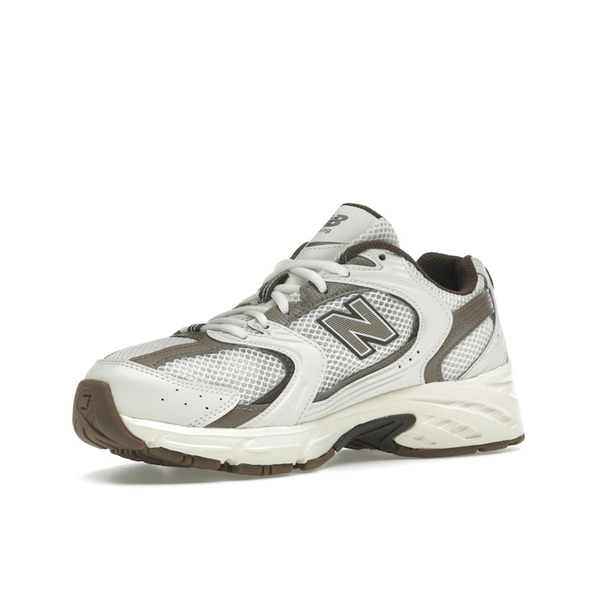 New Balance 530 Turtledove Mushroom, front view, in earthy beige and grey with retro runner profile.