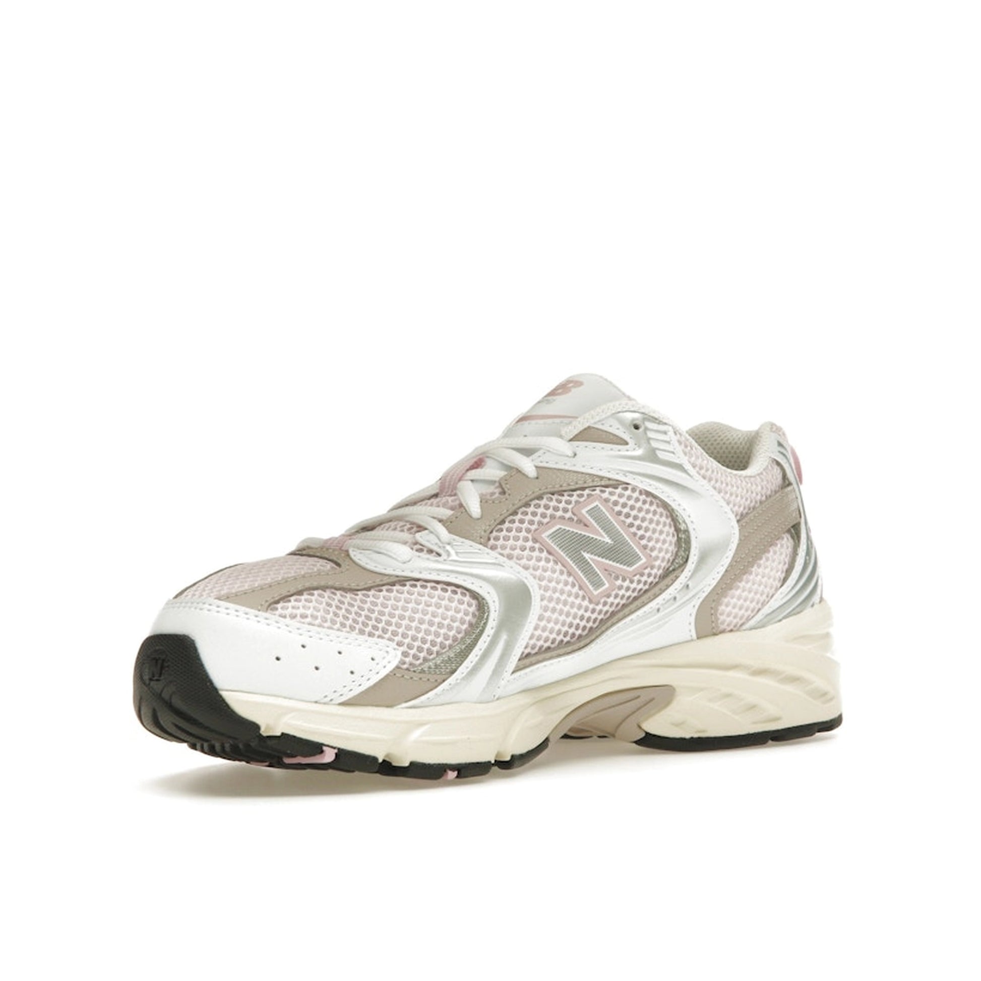 New Balance 530 Pink Granite, front view, in pastel pink tones with grey and white details.