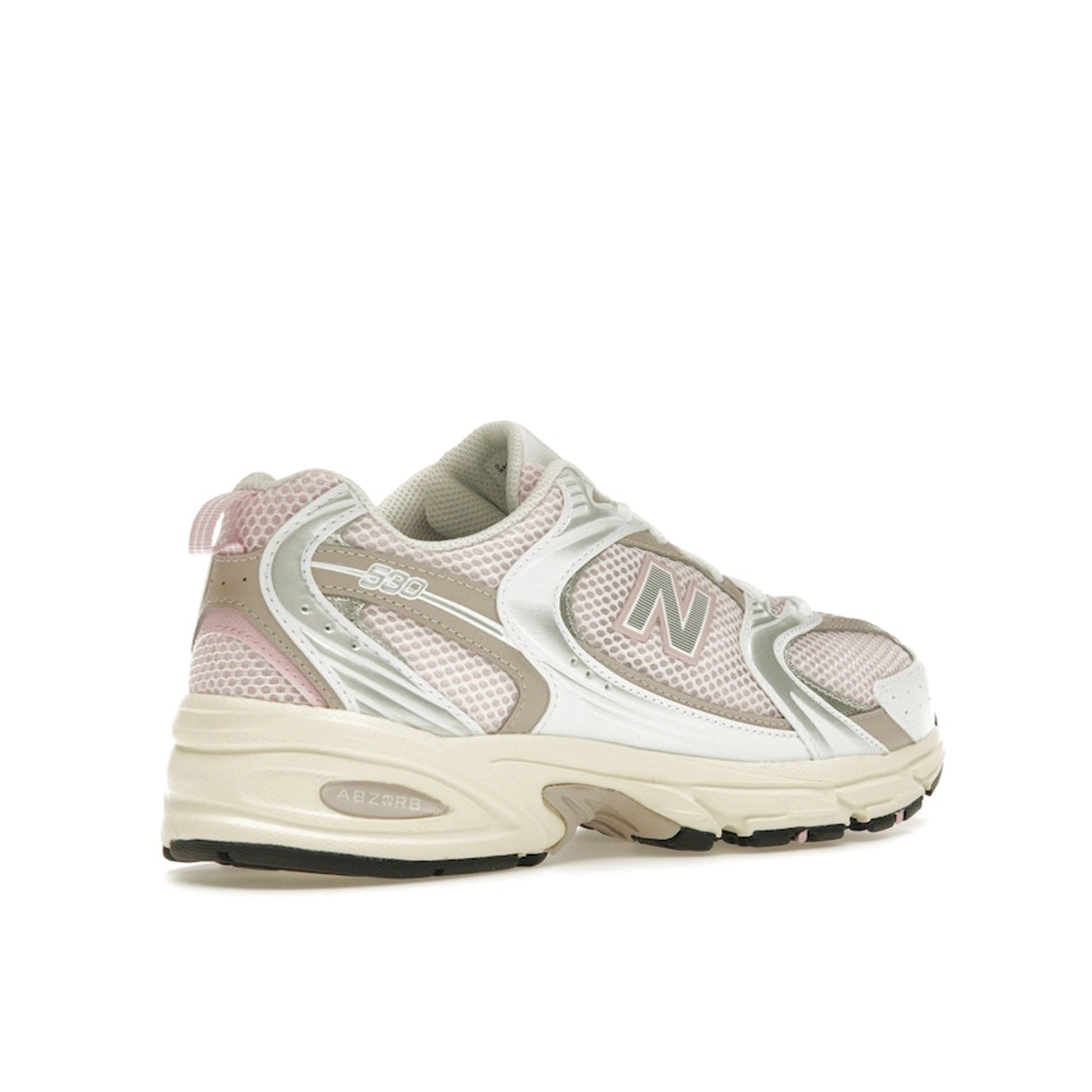 New Balance 530 Pink Granite, back view, in pastel pink tones with grey and white details.
