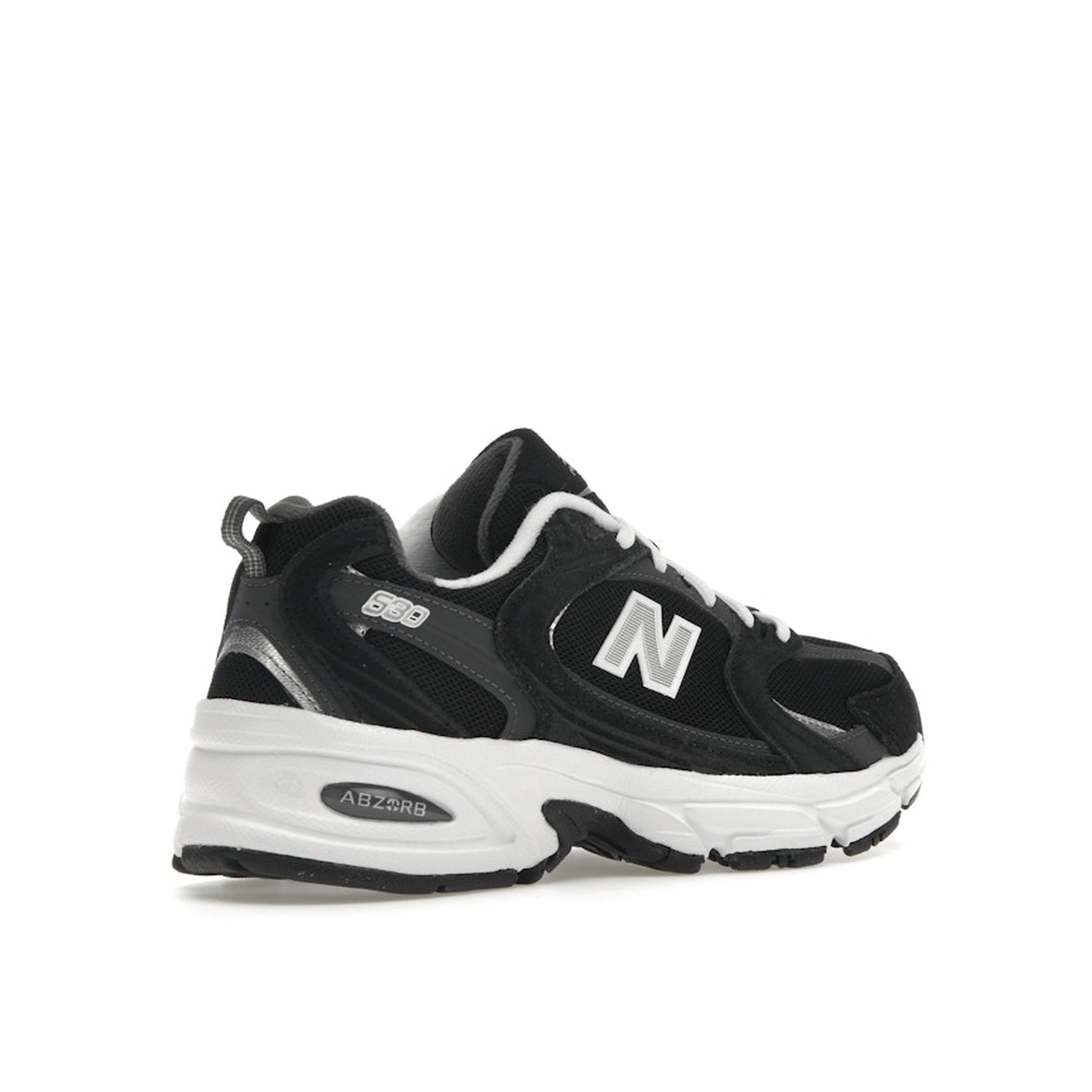 New Balance 530 Classic, back view, in black with silver and grey details.