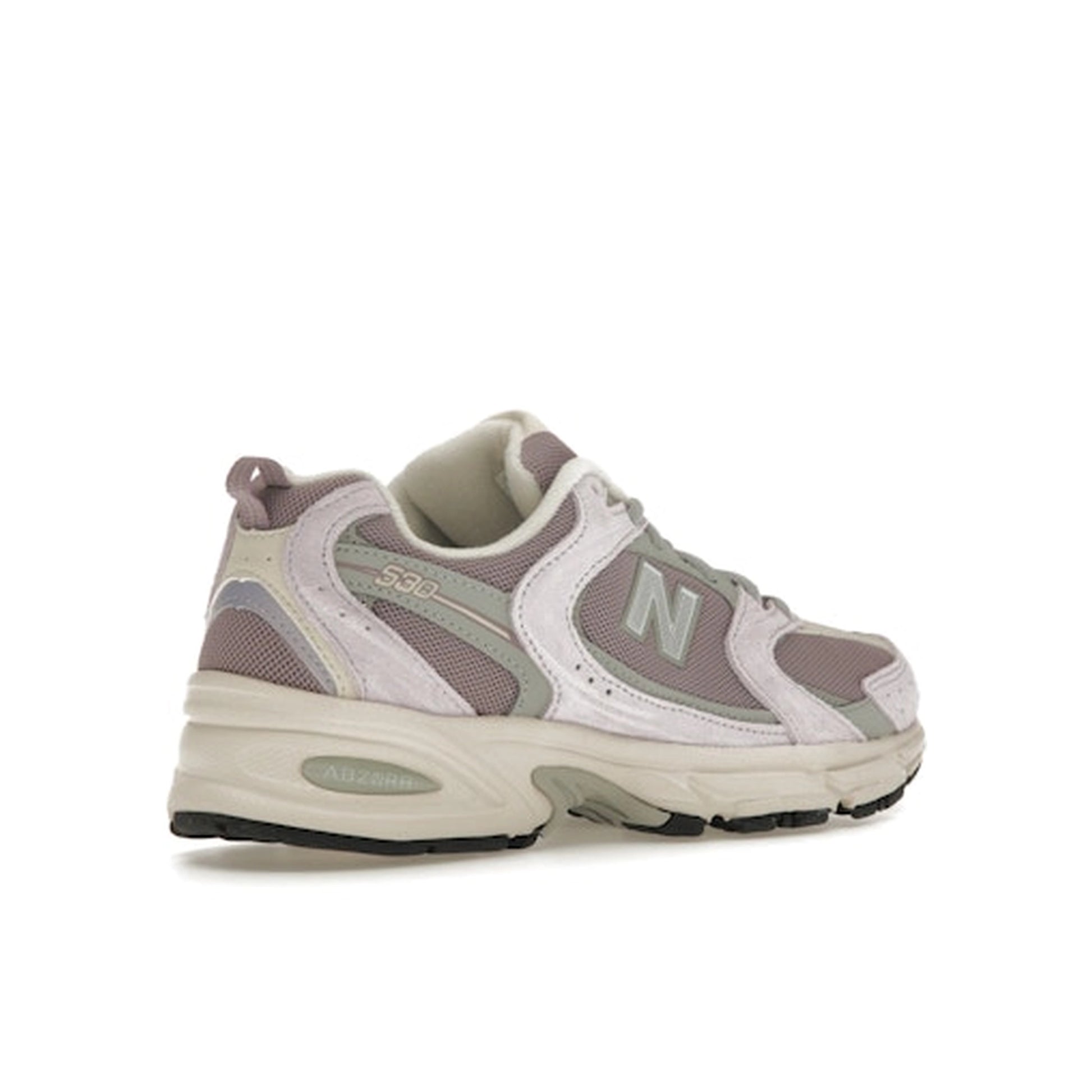 New Balance 530 sneakers, back view, in lilac and viola with white and silver details.