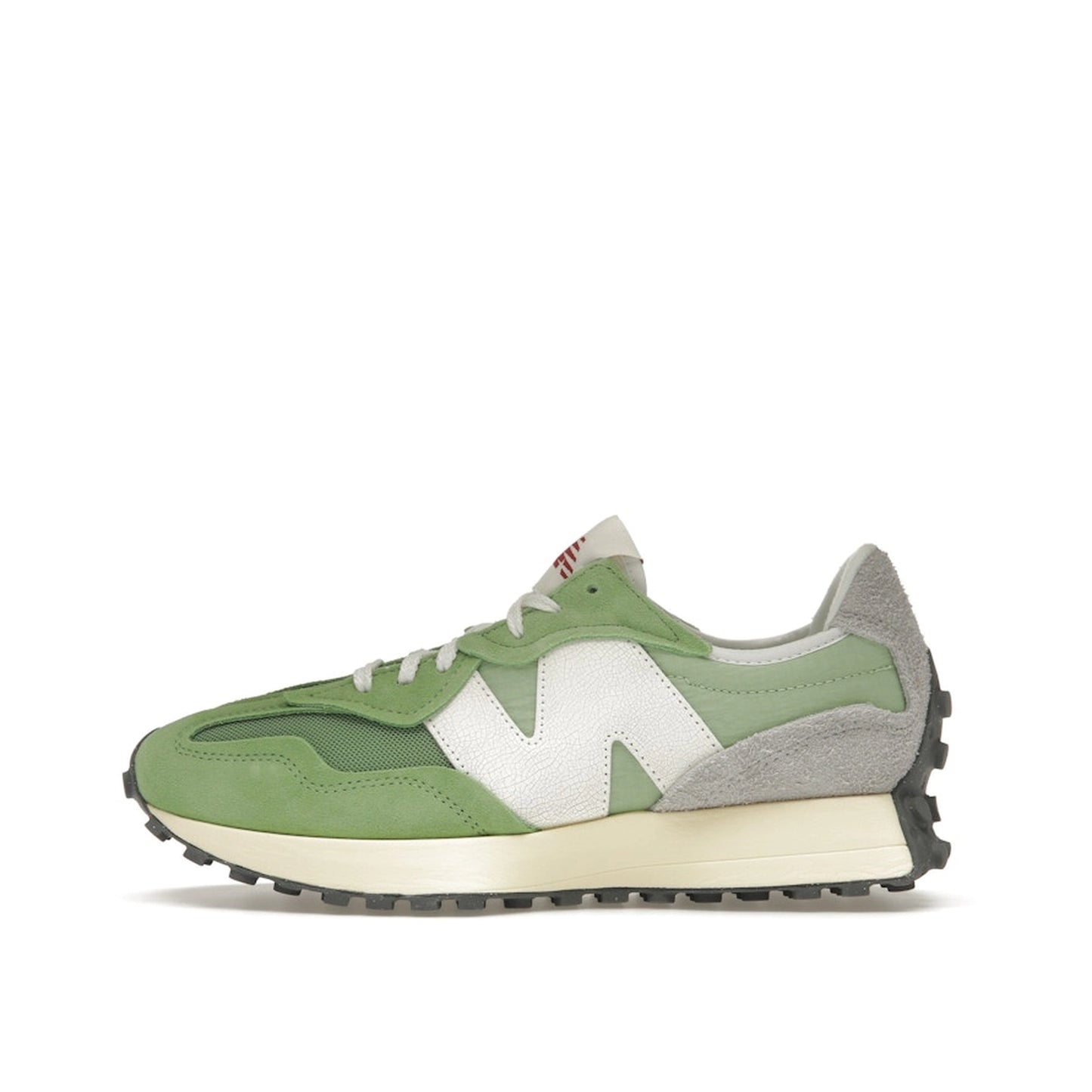 New Balance 327 sneakers, side view, in chive green and avocado with white details.